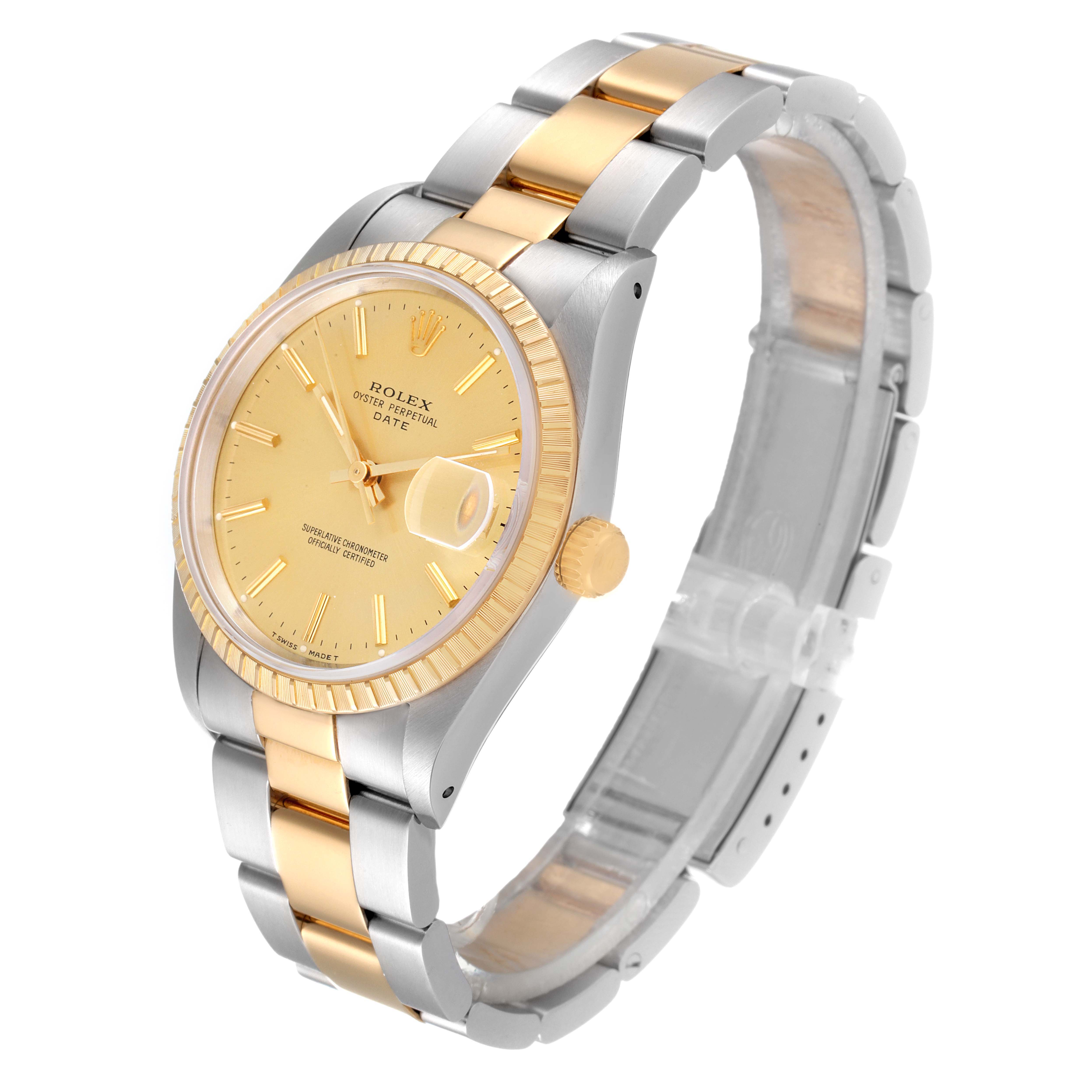 The Rolex Date 15223 Men's Steel and Gold (two tone) Champagne Dial 15223 Men's Steel and Gold (two tone) Champagne Dial watch is shown at a three-quarter angle, displaying the face, fluted bezel, and two-tone bracelet.