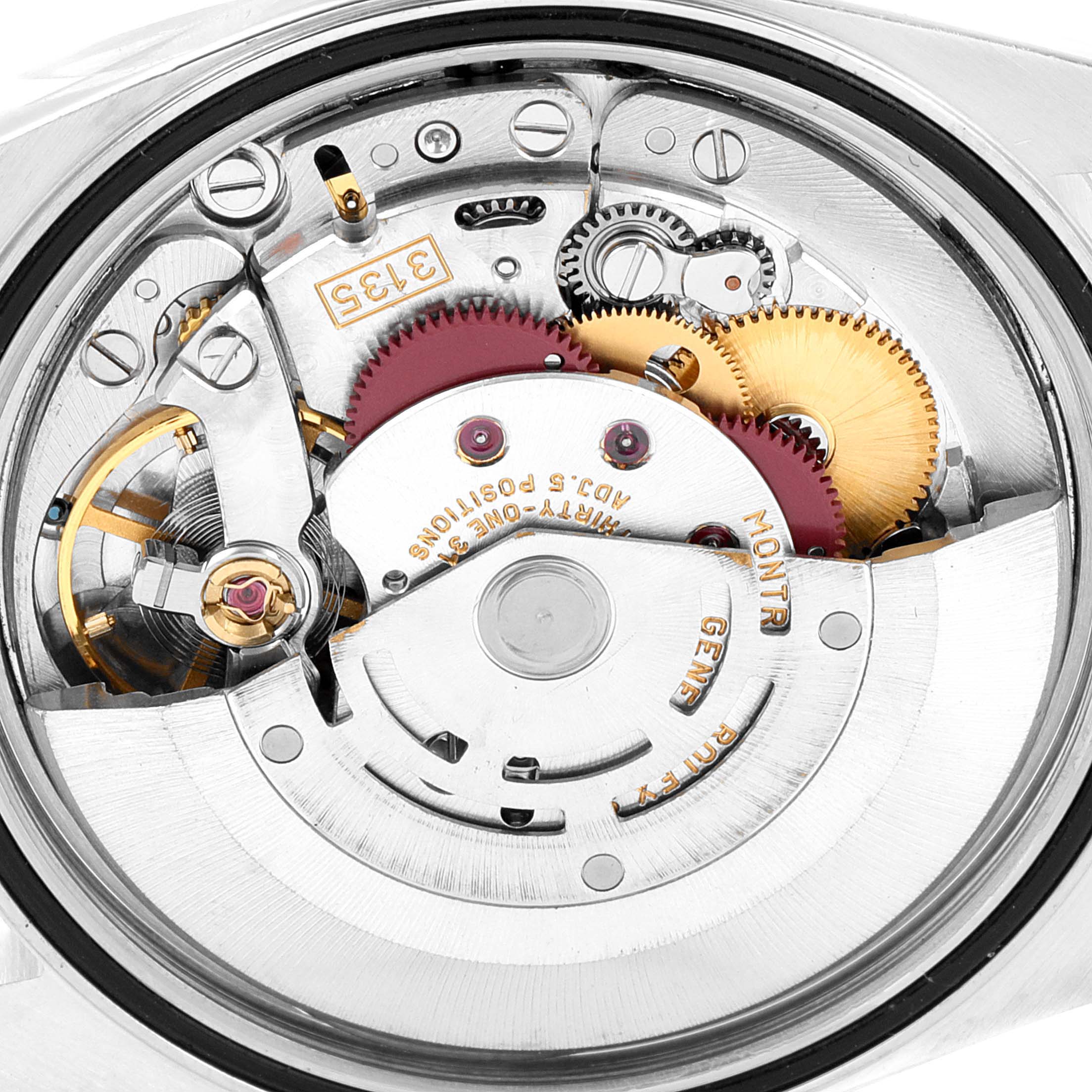 This is a close-up shot of the movement mechanism inside a Rolex Datejust 16234 Men's Stainless Steel Silver Dial 16234 Men's Stainless Steel Silver Dial watch.