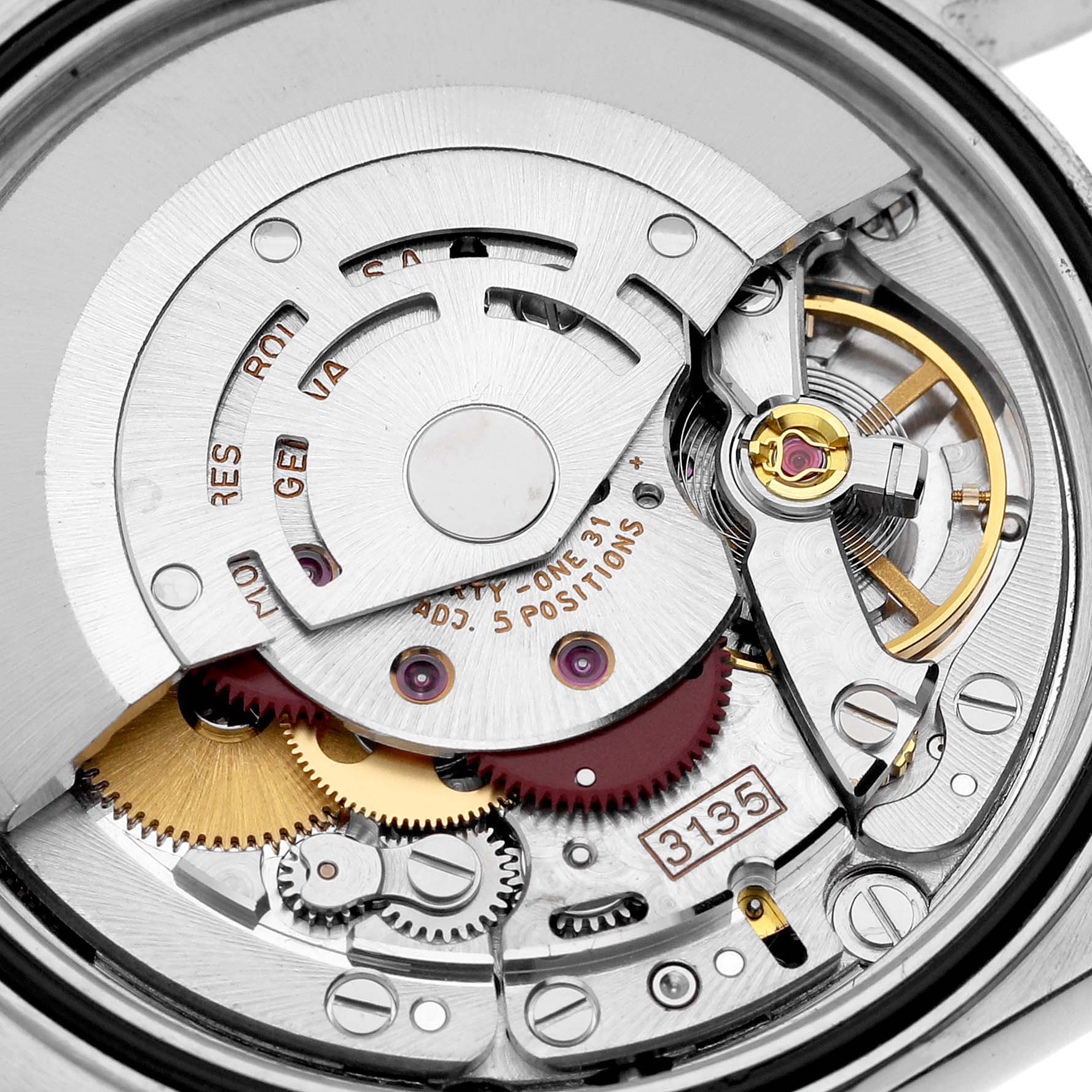 This image shows the internal mechanism of a Rolex Datejust 16233 Men's Steel and Gold (two tone) Black Dial 16233 Men's Steel and Gold (two tone) Black Dial watch, highlighting its intricate gears and components.