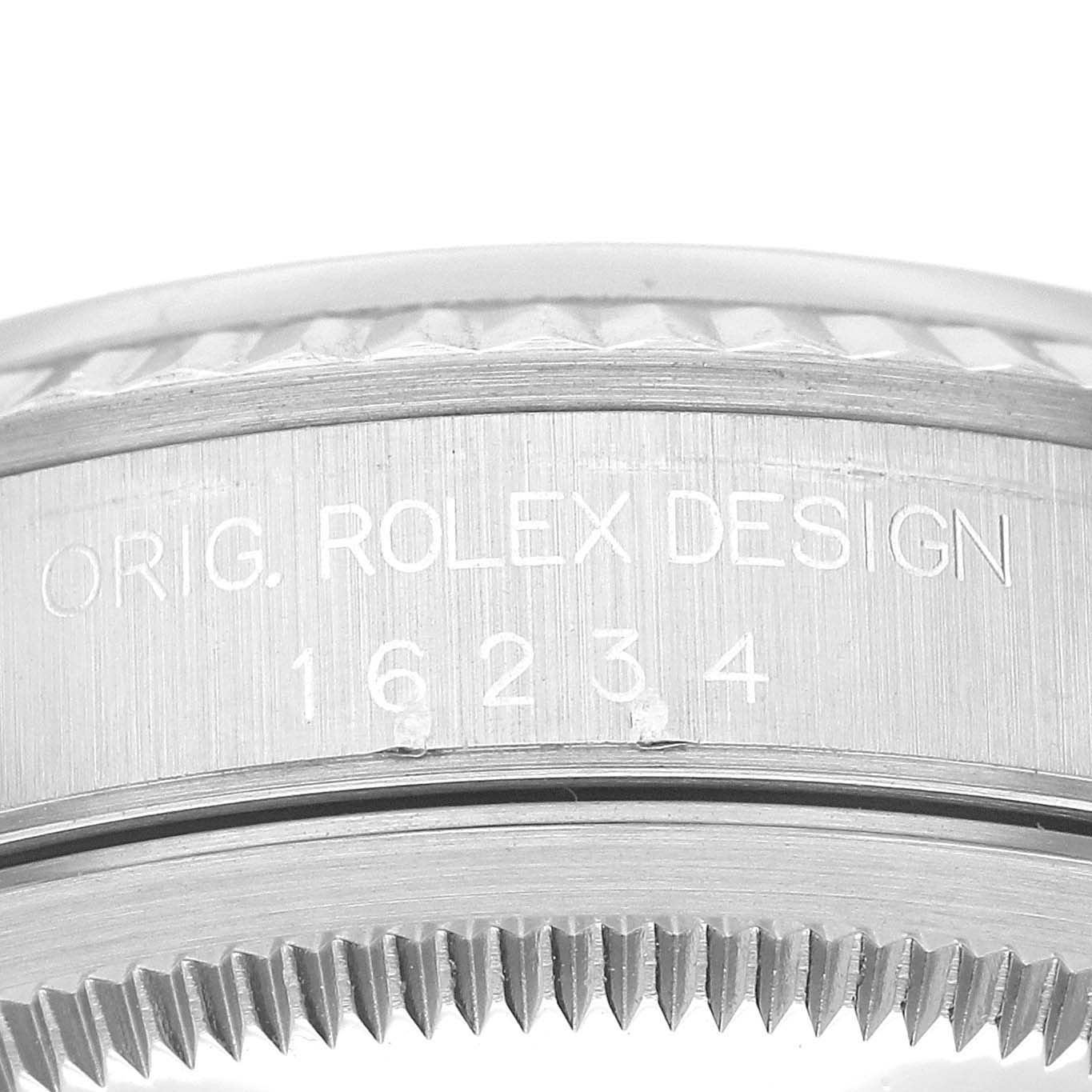 The image shows a close-up of the side of a Rolex Datejust 16234 Men's Stainless Steel Blue Dial 16234 Men's Stainless Steel Blue Dial watch case, featuring the model number engraving.