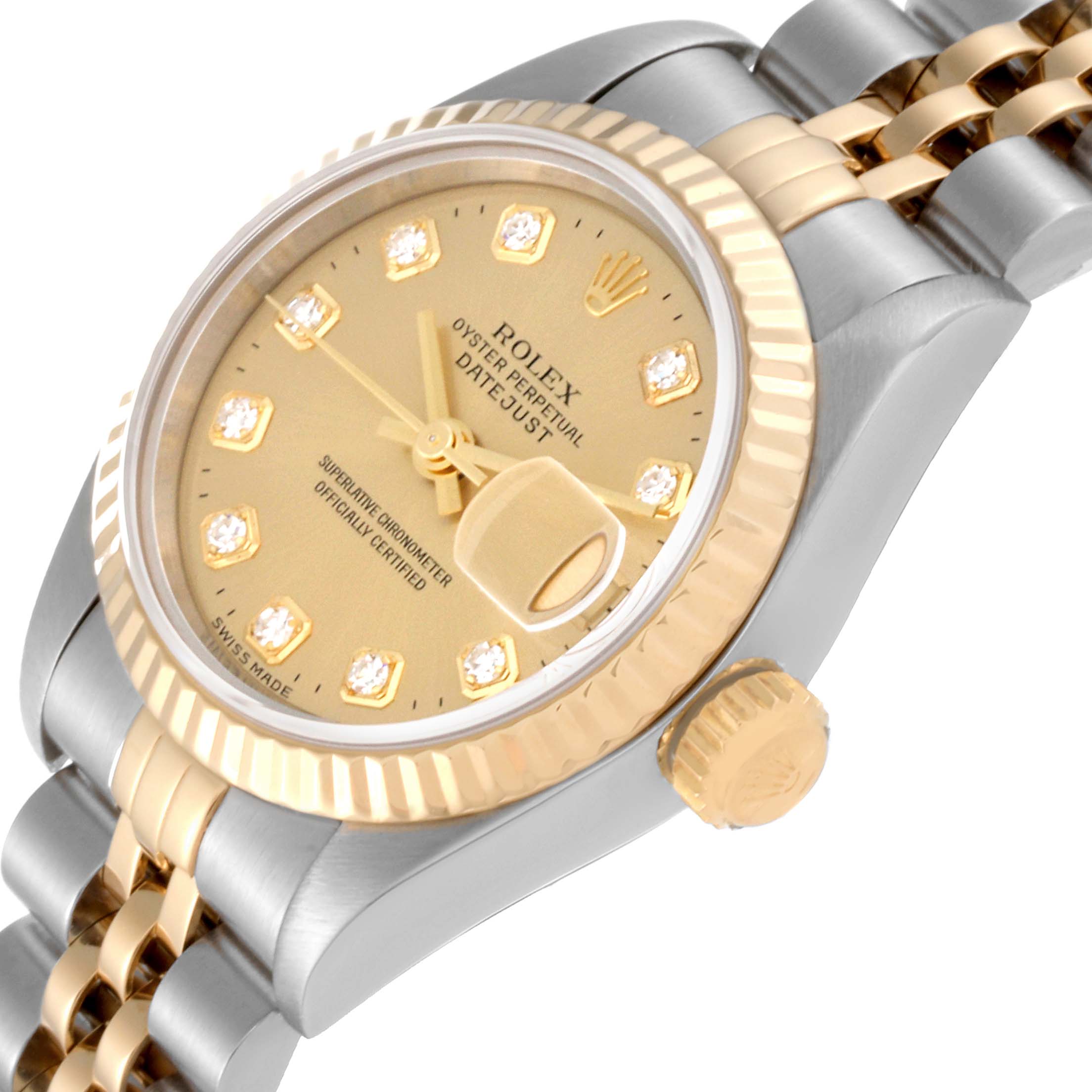 This image shows a close-up angle of the dial and part of the bracelet of a Rolex Datejust 69173 Women's Steel and Gold (two tone) Champagne Dial 69173 Women's Steel and Gold (two tone) Champagne Dial watch.