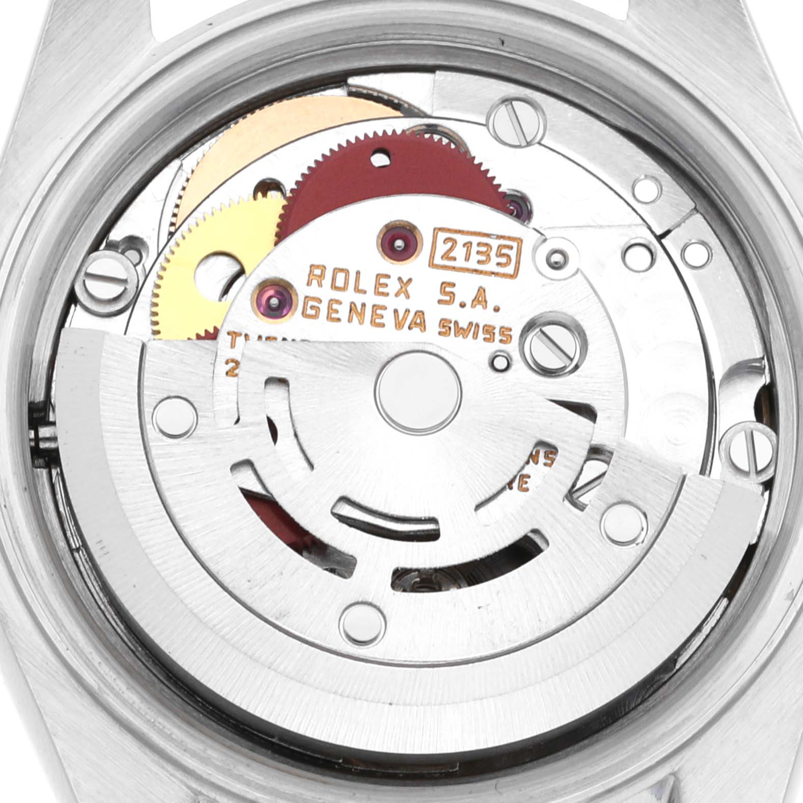 This is a close-up view of the internal mechanism of a Rolex Datejust 69173 Women's Steel and Gold (two tone) Champagne Dial 69173 Women's Steel and Gold (two tone) Champagne Dial watch, showing gears and the rotor.