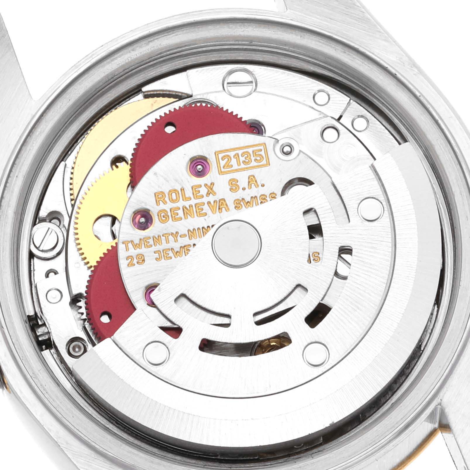 This image shows the internal movement mechanism of the Rolex Datejust 69173 Women's Steel and Gold (two tone) Champagne Dial 69173 Women's Steel and Gold (two tone) Champagne Dial watch, highlighting its intricate gears and components.