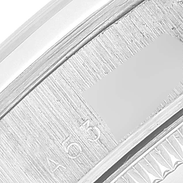 The image shows a close-up view of the case back edge with engraved details of a Rolex Mid-Size 78246 Women's Platinum White Dial 78246 Women's Platinum White Dial watch.