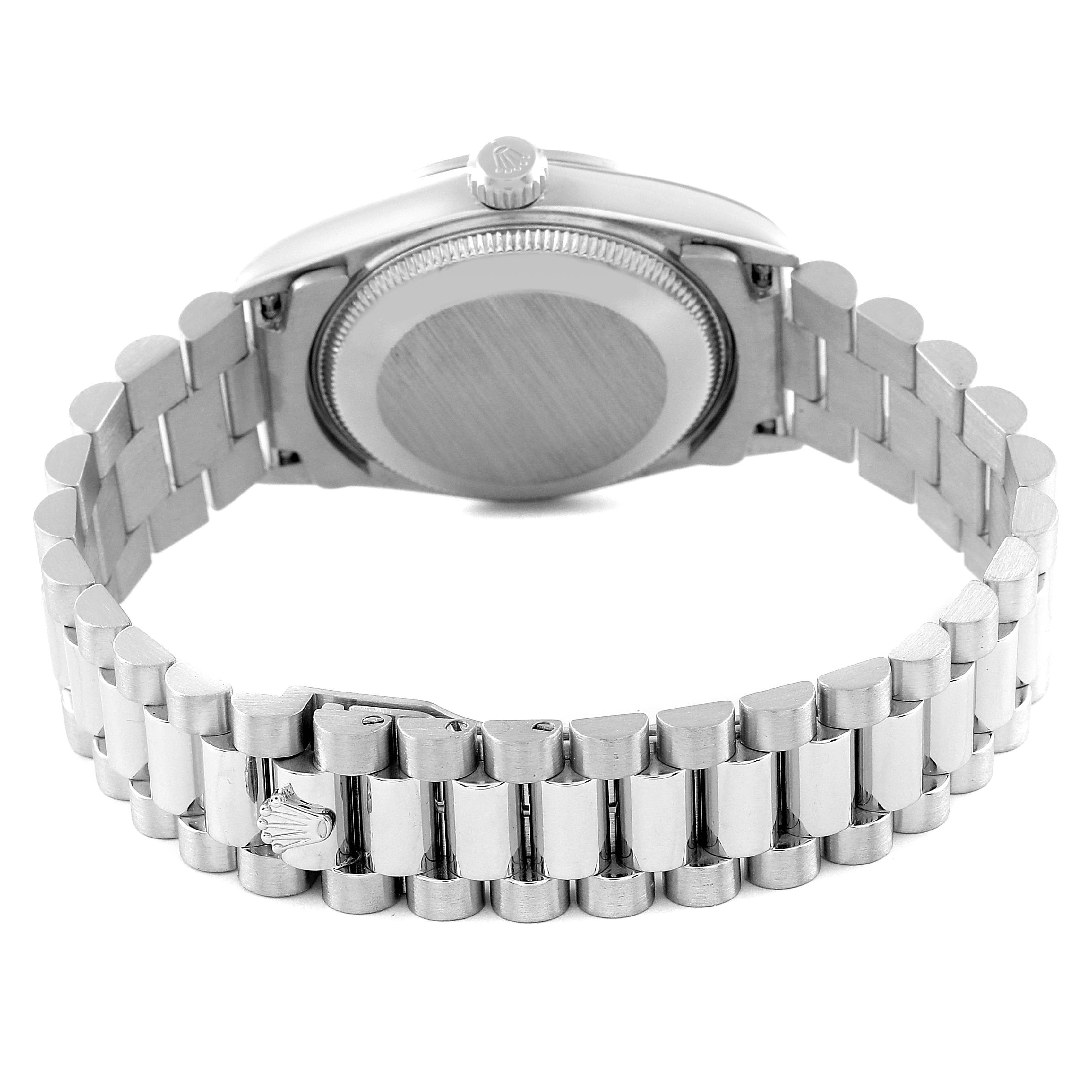 The image shows the back and band of a Rolex Mid-Size 78246 Women's Platinum White Dial 78246 Women's Platinum White Dial watch.