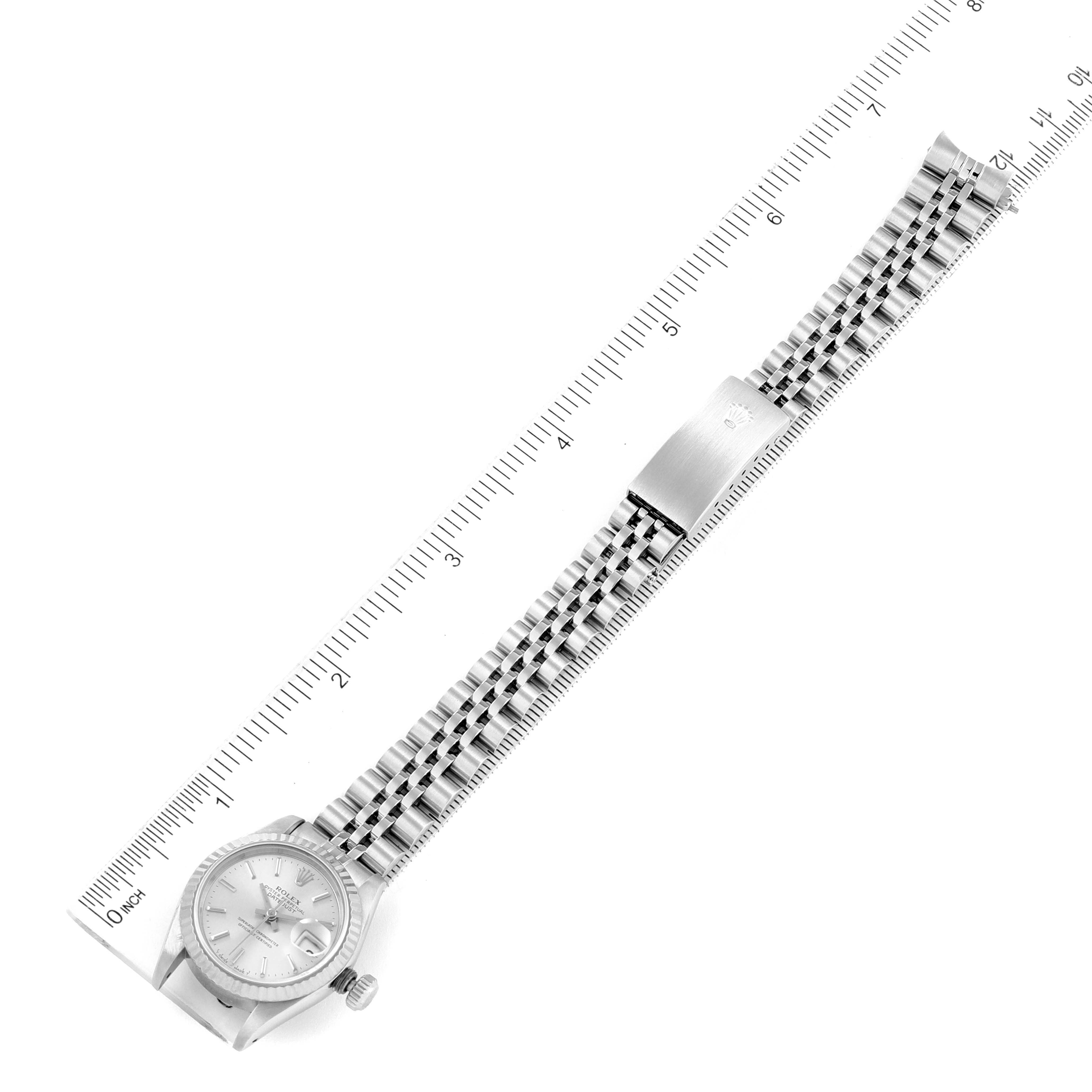 This image shows a top view of a Rolex Datejust 69174 Women
s Stainless Steel Silver Dial 69174 Women
s Stainless Steel Silver Dial watch, displaying the full bracelet and the watch face.