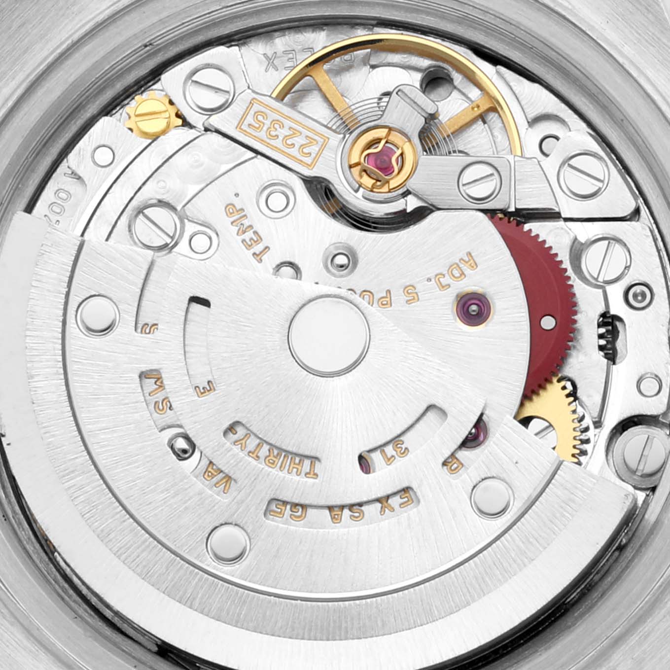 The image shows a close-up of the movement mechanism of the Rolex Datejust 79173G Women's Steel and Gold (two tone) Champagne Dial 79173G Women's Steel and Gold (two tone) Champagne Dial watch.