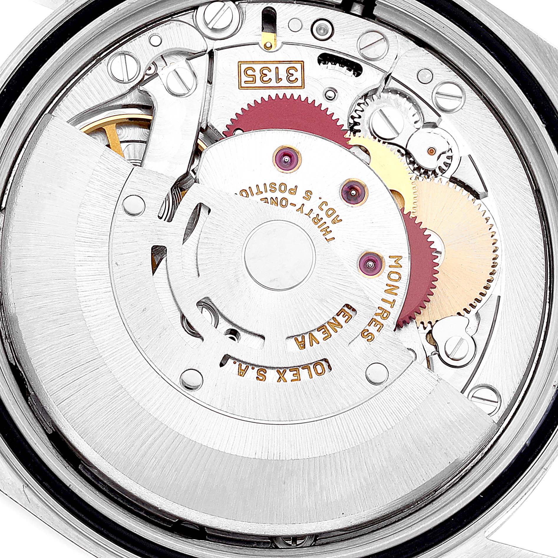 This image shows a close-up view of the internal movement mechanism of a Rolex Datejust 16233 Men's Steel and Gold (two tone) Black Dial 16233 Men's Steel and Gold (two tone) Black Dial watch.