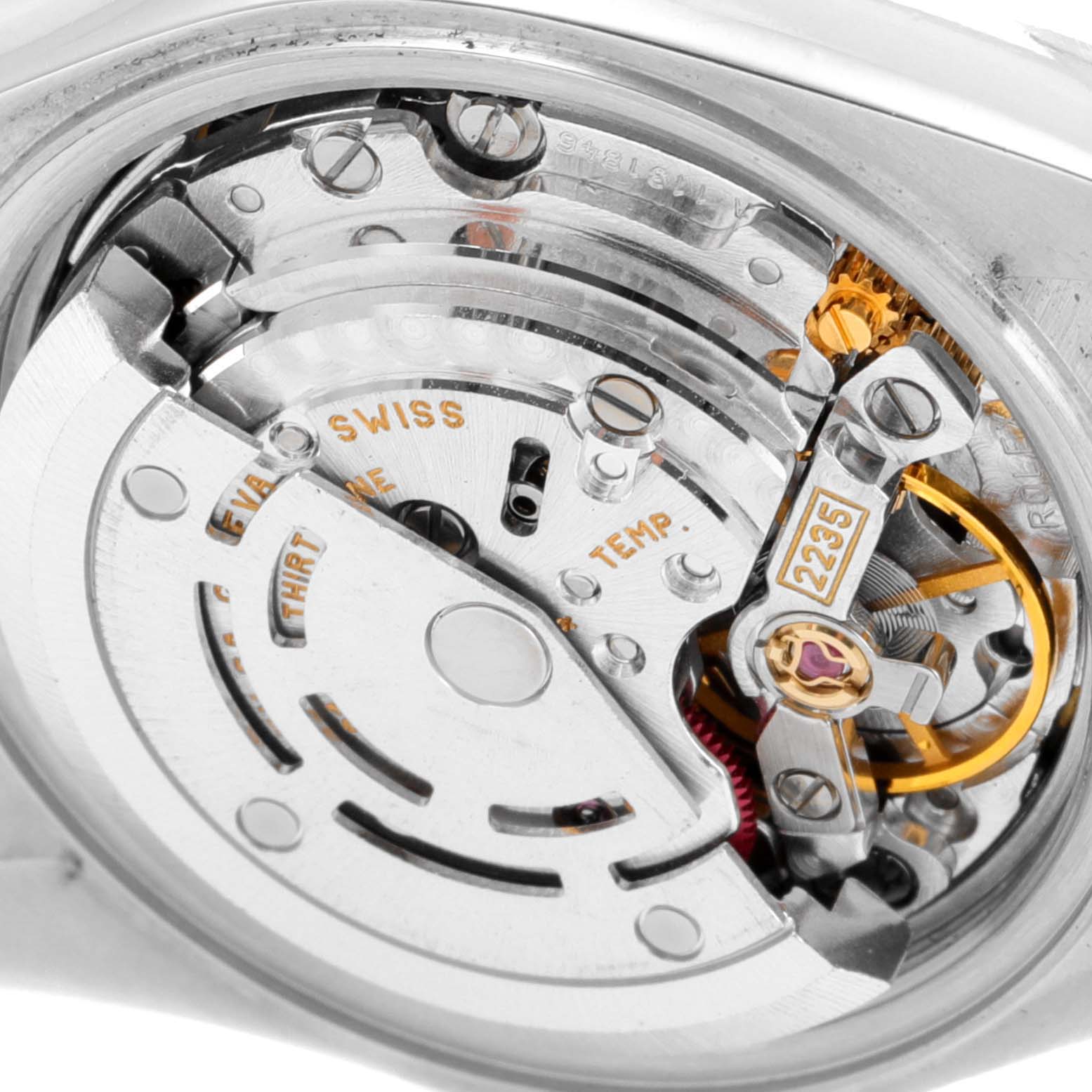 The image shows the internal mechanism of a Rolex Datejust 79173 Women's Steel and Gold (two tone) Blue Dial 79173 Women's Steel and Gold (two tone) Blue Dial watch, highlighting its intricate movement components.