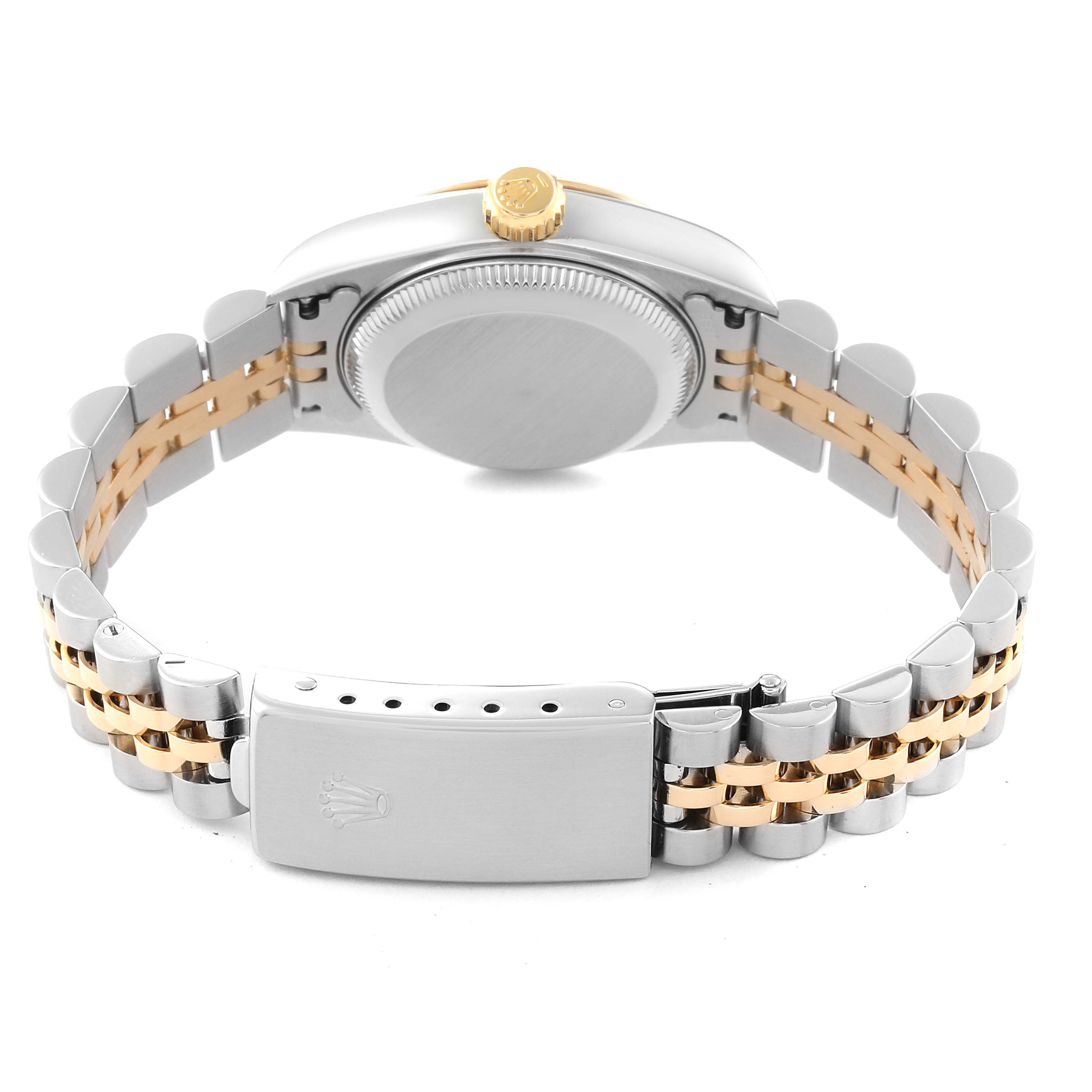 The image shows the back view of a Rolex Datejust 79173G Women's Steel and Gold (two tone) Champagne Dial 79173G Women's Steel and Gold (two tone) Champagne Dial watch, highlighting the case back, crown, and clasp of the bracelet.