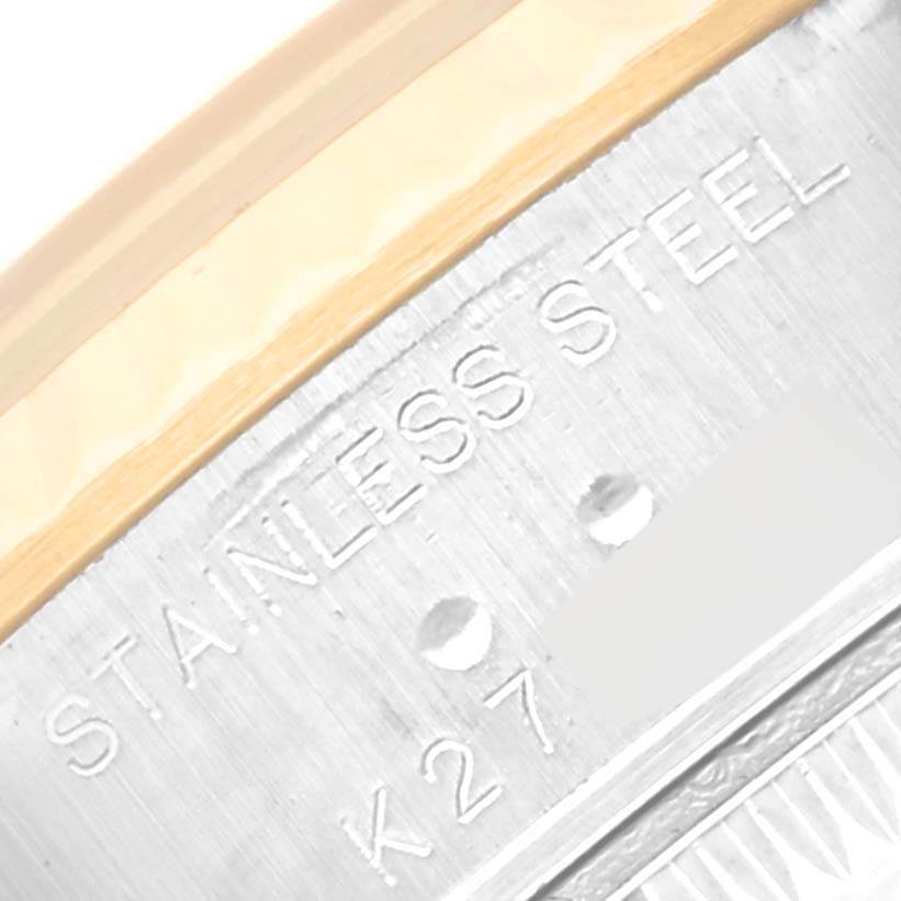 This image shows a close-up of the stainless steel case back of a Rolex Datejust 79173G Women's Steel and Gold (two tone) Champagne Dial 79173G Women's Steel and Gold (two tone) Champagne Dial watch, highlighting the engraved text.