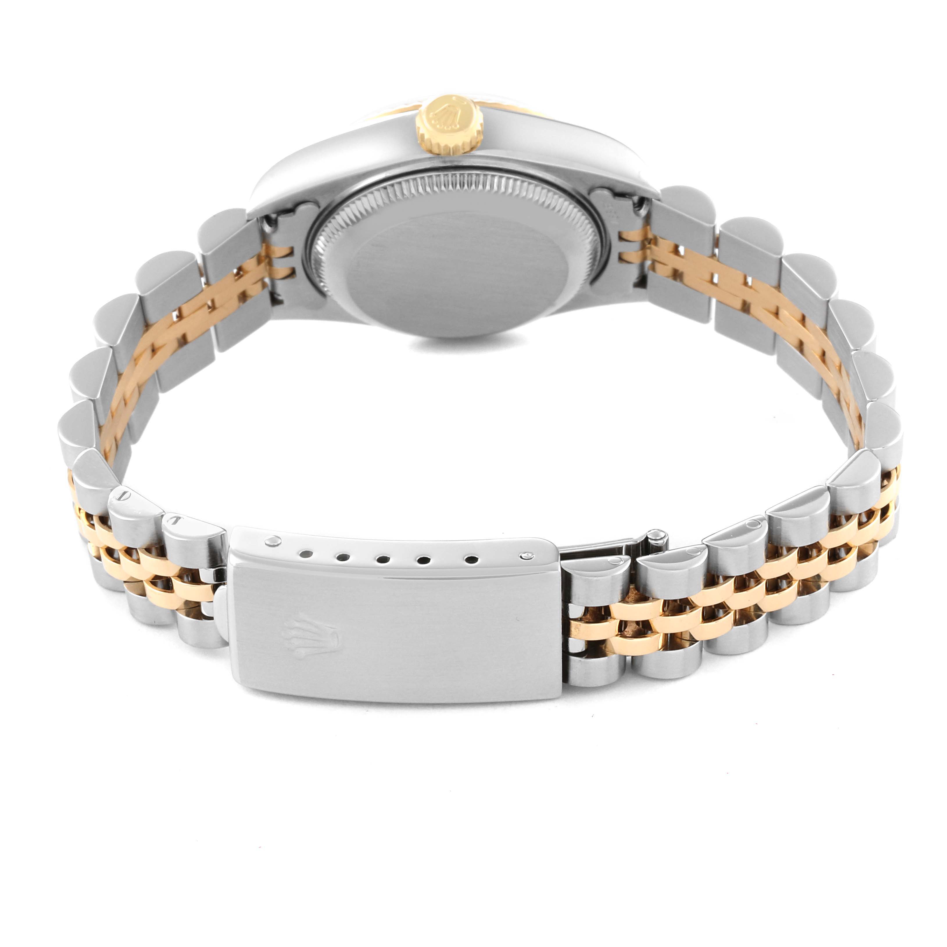 This image shows the back case and bracelet of the Rolex Datejust 79173G Women's Steel and Gold (two tone) Champagne Dial 79173G Women's Steel and Gold (two tone) Champagne Dial watch, highlighting the two-tone metal design.
