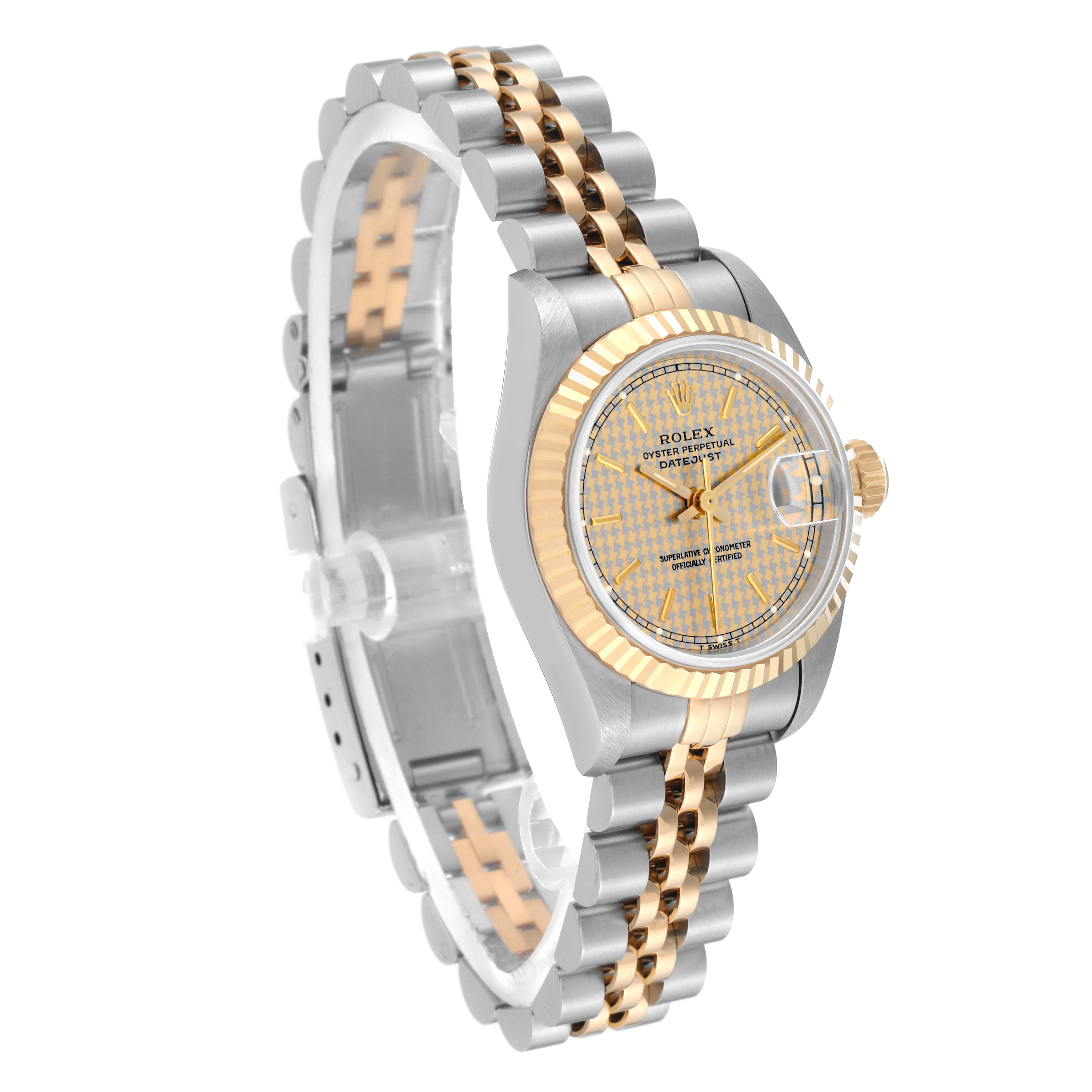 The Rolex Datejust 69173 Women's Steel and Gold (two tone) Champagne Dial 69173 Women's Steel and Gold (two tone) Champagne Dial watch is shown at an oblique angle, highlighting the two-tone bracelet, dial, bezel, and crown.