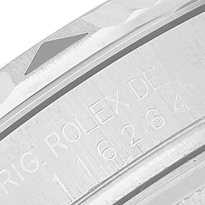 The image shows a close-up of the engraving on the side of a Rolex Turn-o-Graph 116264 Men's Stainless Steel Blue Dial 116264 Men's Stainless Steel Blue Dial model watch.