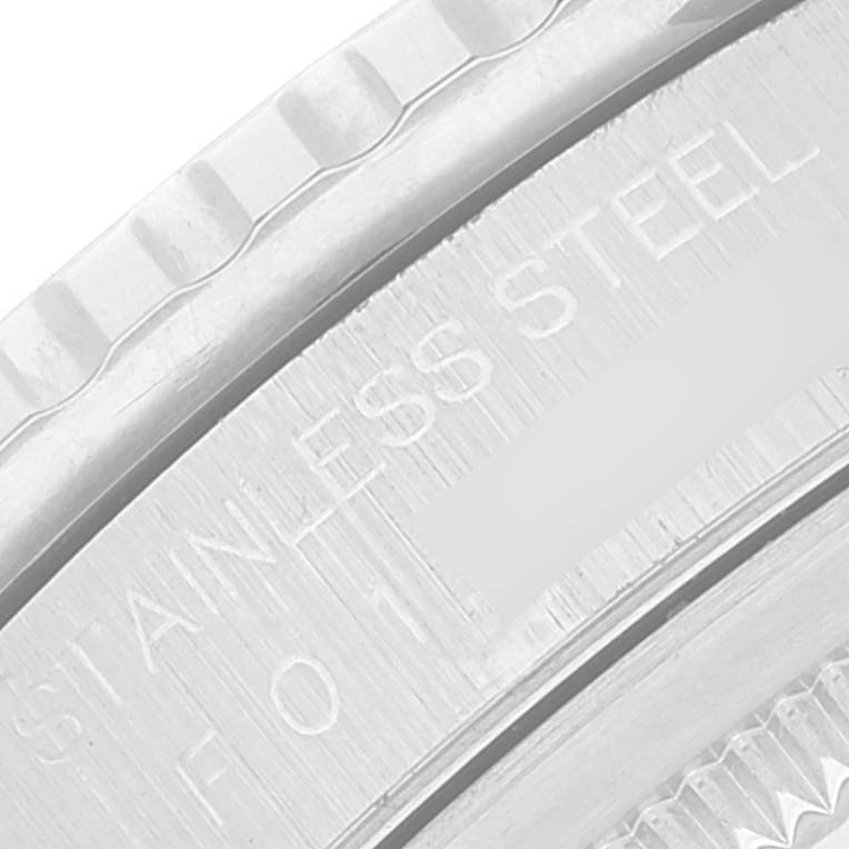 The image shows a close-up of the stainless steel bezel and case back of a Rolex Turn-o-Graph 16264 Men
s Stainless Steel White Dial 16264 Men
s Stainless Steel White Dial watch.