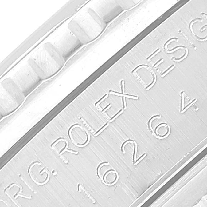 The image shows a close-up of the engraved side of a Rolex Turn-o-Graph 16264 Men
s Stainless Steel White Dial 16264 Men
s Stainless Steel White Dial watch.