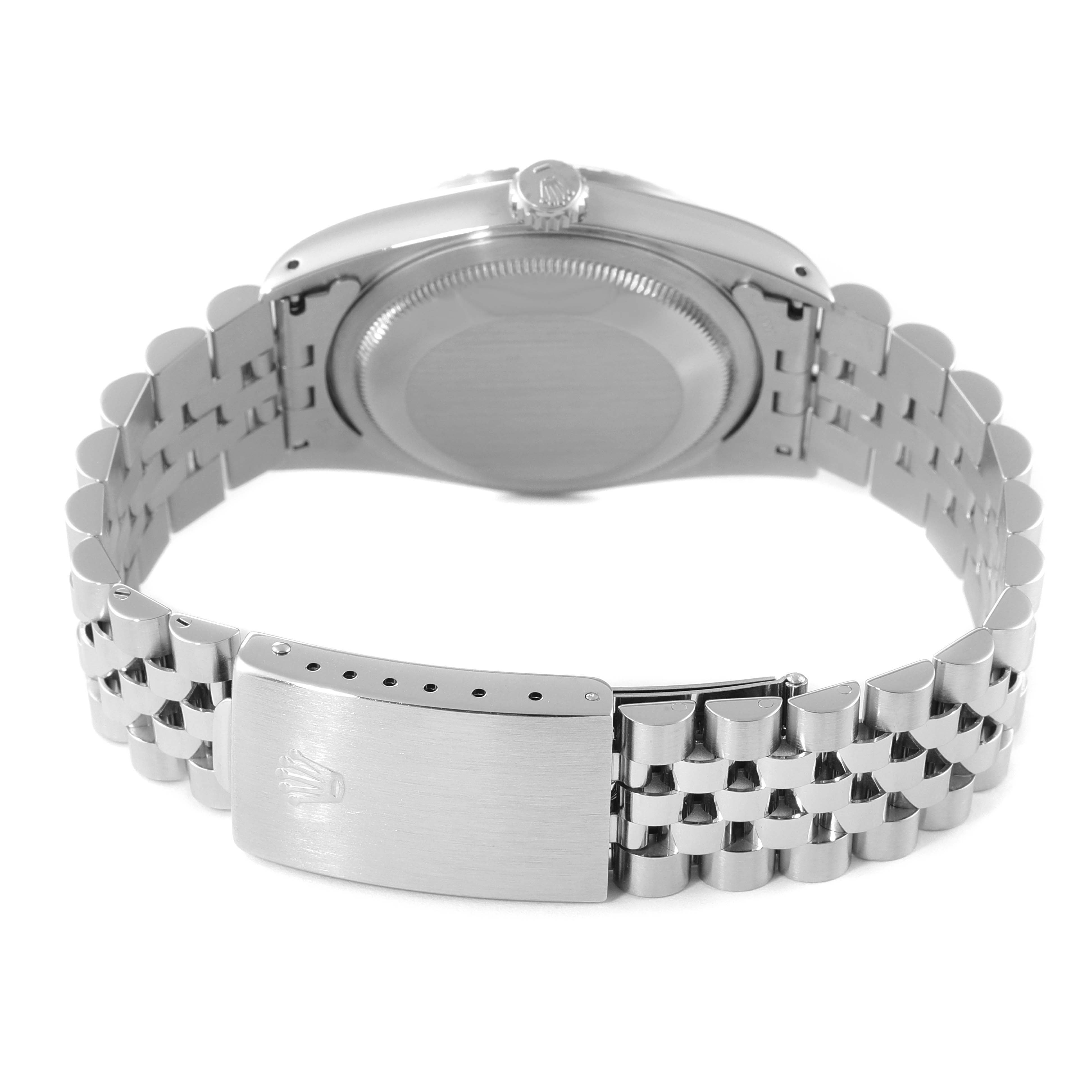 This image shows the back and clasp of a stainless steel Rolex Datejust 16220 Men's Stainless Steel White Dial 16220 Men's Stainless Steel White Dial watch, focusing on the case back and bracelet.