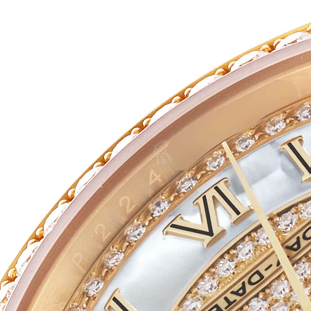 This close-up image shows a portion of the dial and bezel, which is adorned with diamonds, on a Rolex President 118348 Men's Yellow Gold Mother of Pearl Dial 118348 Men's Yellow Gold Mother of Pearl Dial model watch.