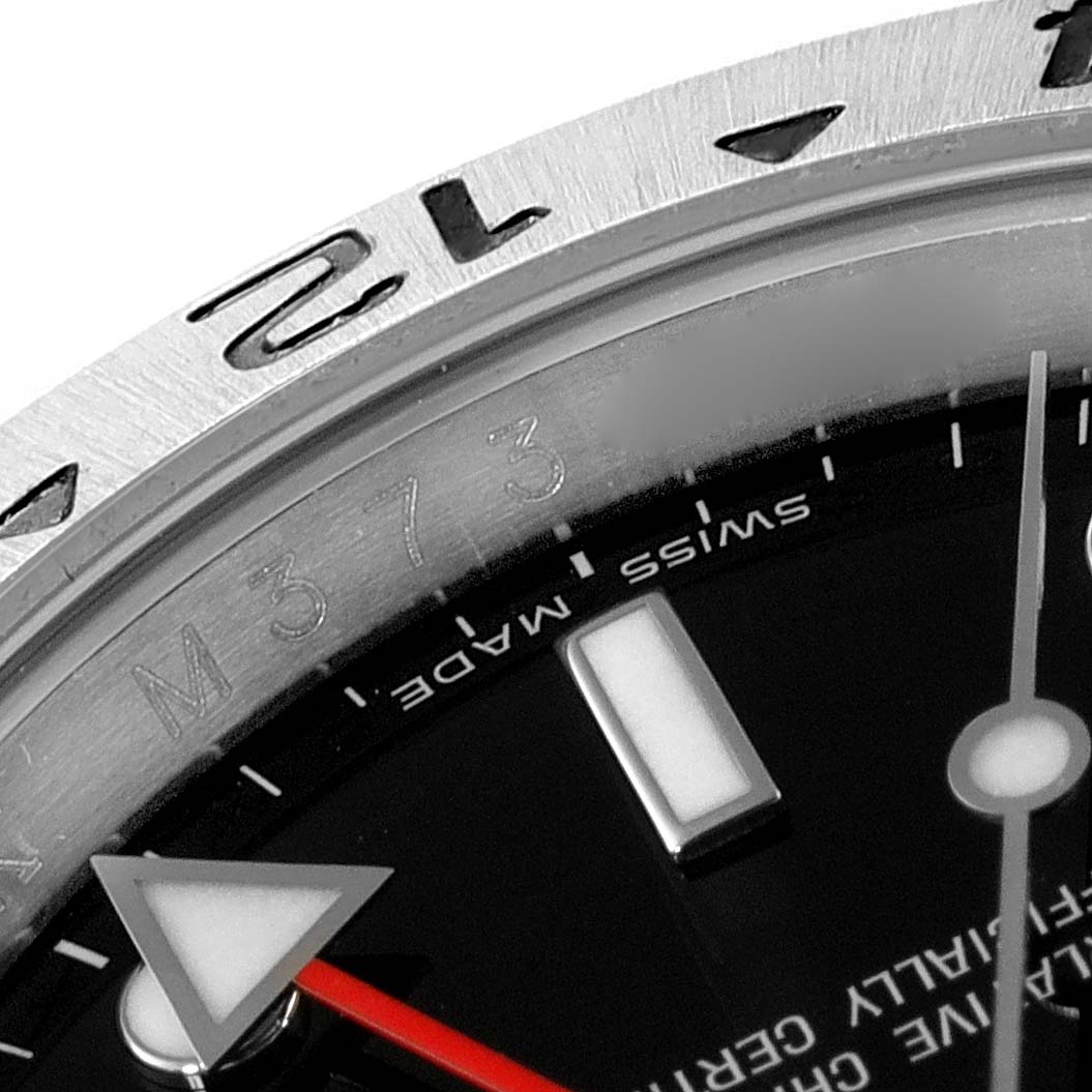 Close-up angle showing the bezel, part of the dial, and hands of the Rolex Explorer 16570 Men
s Stainless Steel Black Dial 16570 Men
s Stainless Steel Black Dial model watch.