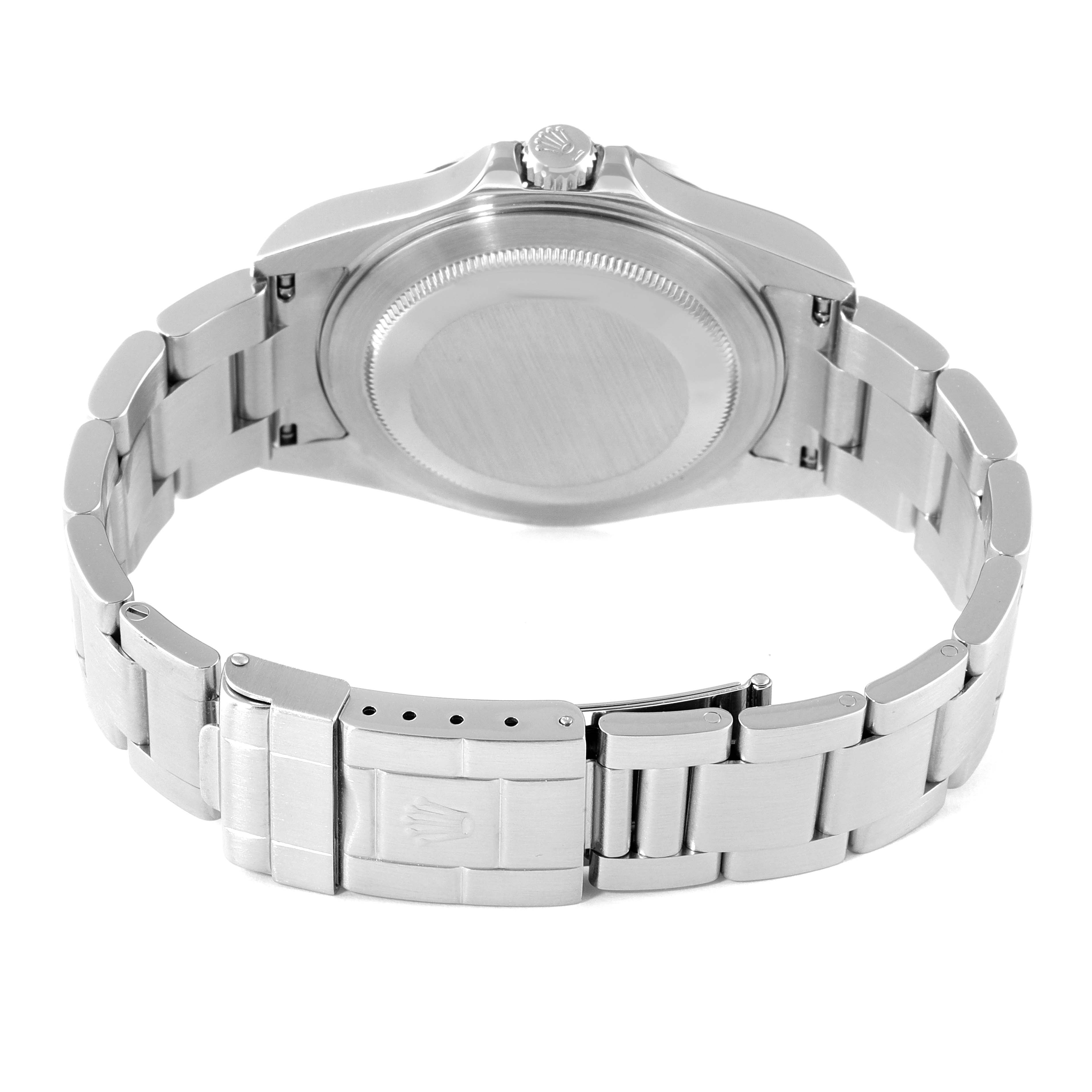 The image shows the back of a Rolex Explorer 16570 Men
s Stainless Steel Black Dial 16570 Men
s Stainless Steel Black Dial watch with its metal bracelet and clasp.