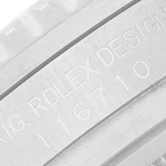 This image shows an angled close-up of the case engraving on a Rolex GMT-Master 116710 Men
s Stainless Steel Black Dial 116710 Men
s Stainless Steel Black Dial model, highlighting the brand name and model number.