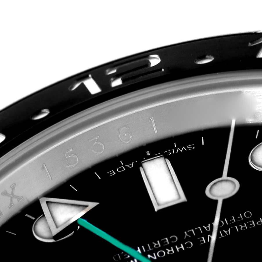 The image shows a close-up of the dial and bezel of a Rolex GMT-Master 116710 Men's Stainless Steel Black Dial 116710 Men's Stainless Steel Black Dial, focusing on the hour markers and hands.