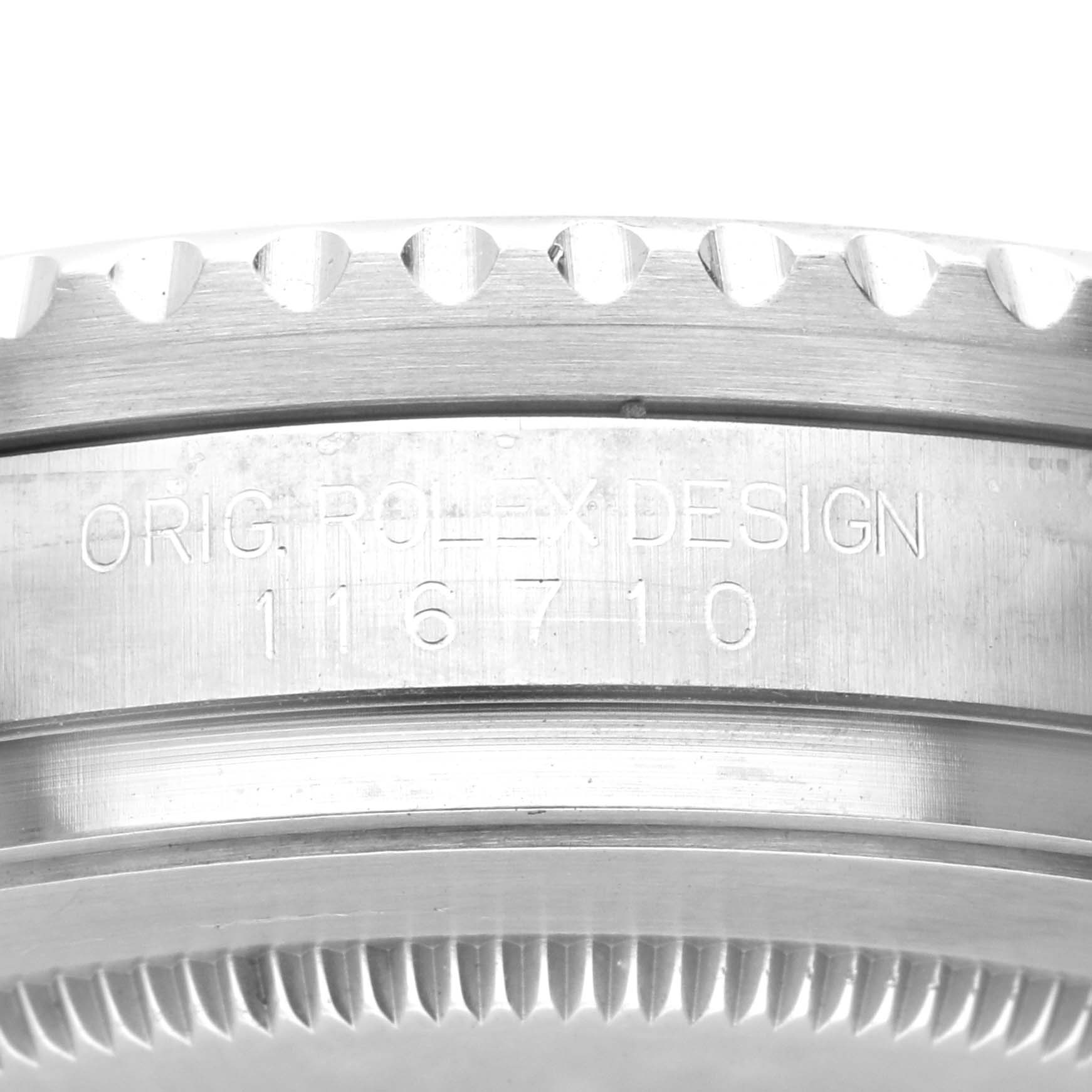 The image shows a close-up side view of the engraved case back rim of a Rolex GMT-Master 116710 Men's Stainless Steel Black Dial 116710 Men's Stainless Steel Black Dial watch, featuring the model number.