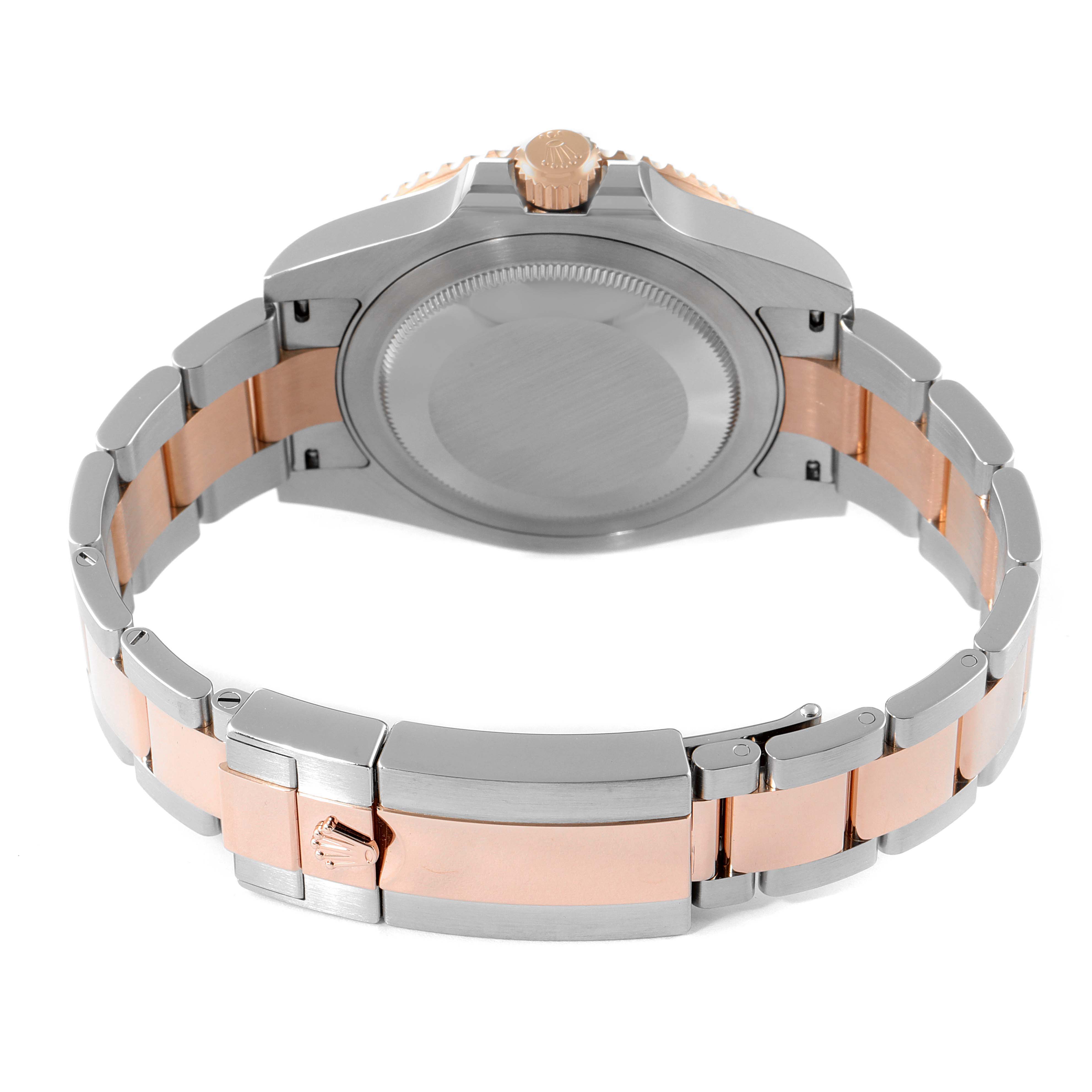 The image shows the back case and bracelet of a Rolex GMT-Master 126711CHNR Men's Steel and Gold (two tone) Black Dial 126711CHNR Men's Steel and Gold (two tone) Black Dial watch, featuring a two-tone metal design.