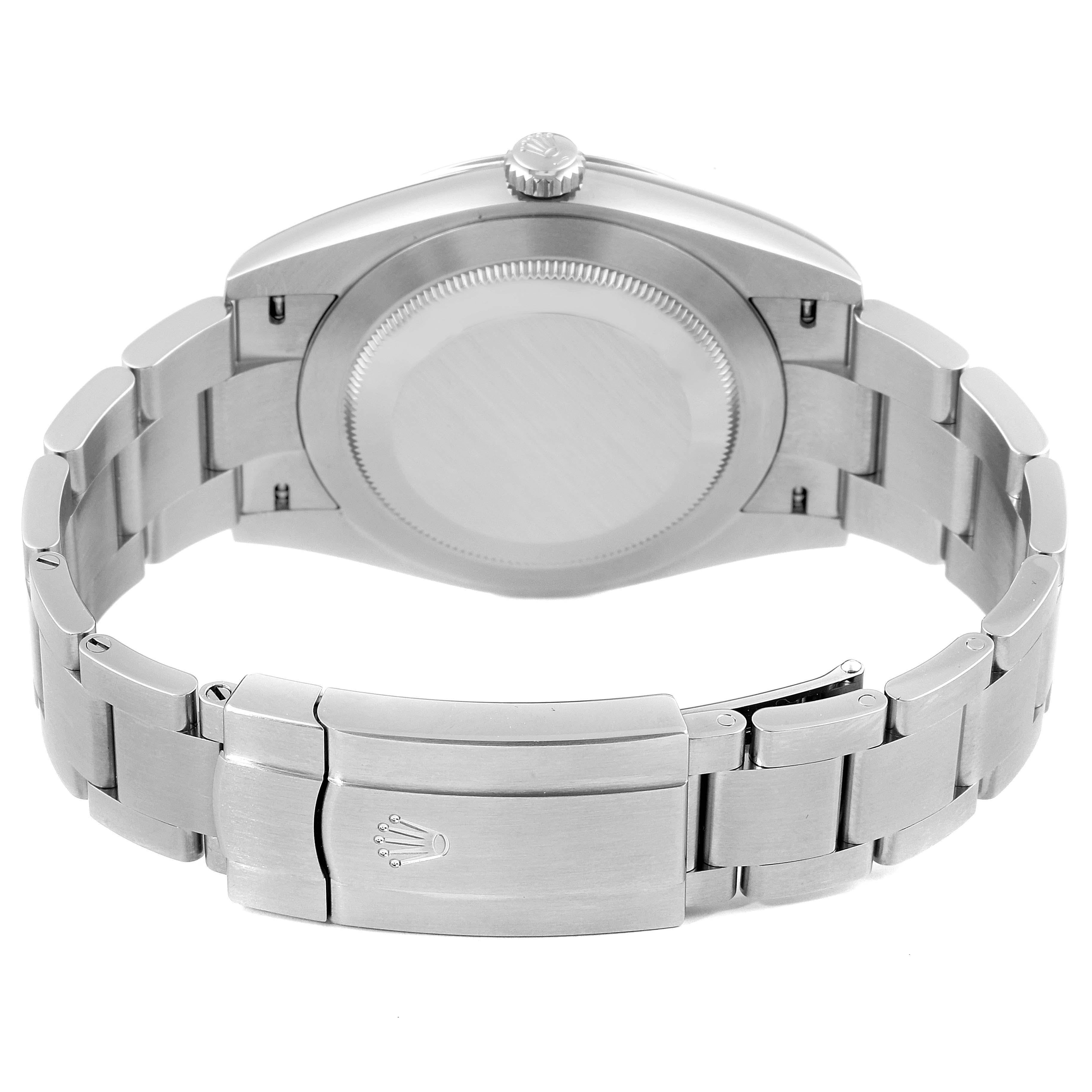 This image shows the back view of a Rolex Oyster Perpetual 124300 Men's Stainless Steel Blue Dial 124300 Men's Stainless Steel Blue Dial watch, highlighting its bracelet and closed clasp.