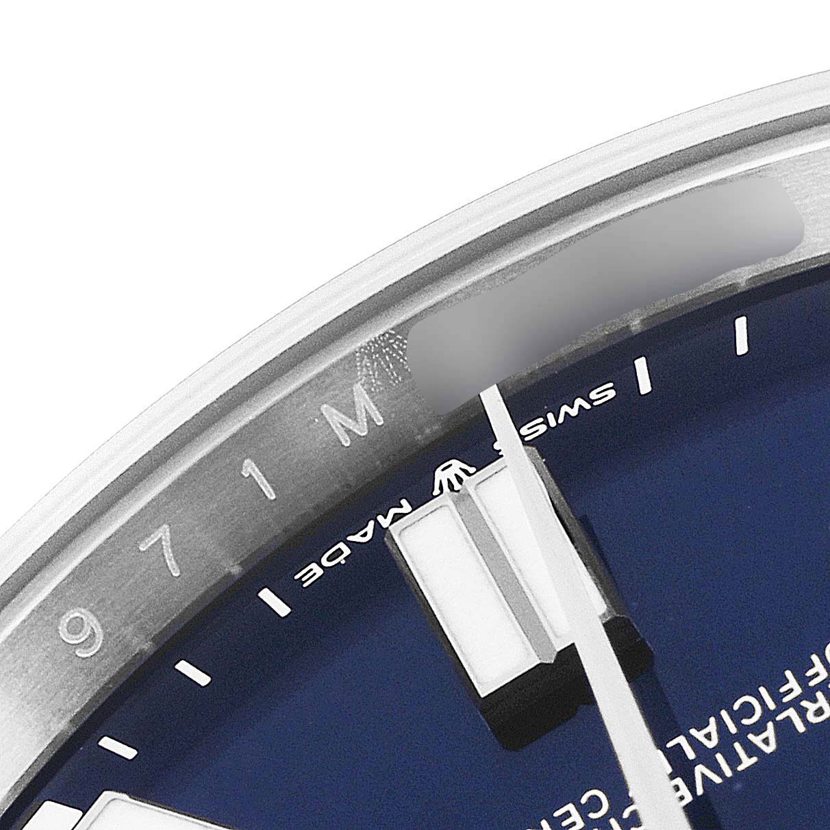 The image shows a close-up angle of the dial and part of the bezel of a Rolex Oyster Perpetual 124300 Men's Stainless Steel Blue Dial 124300 Men's Stainless Steel Blue Dial watch.