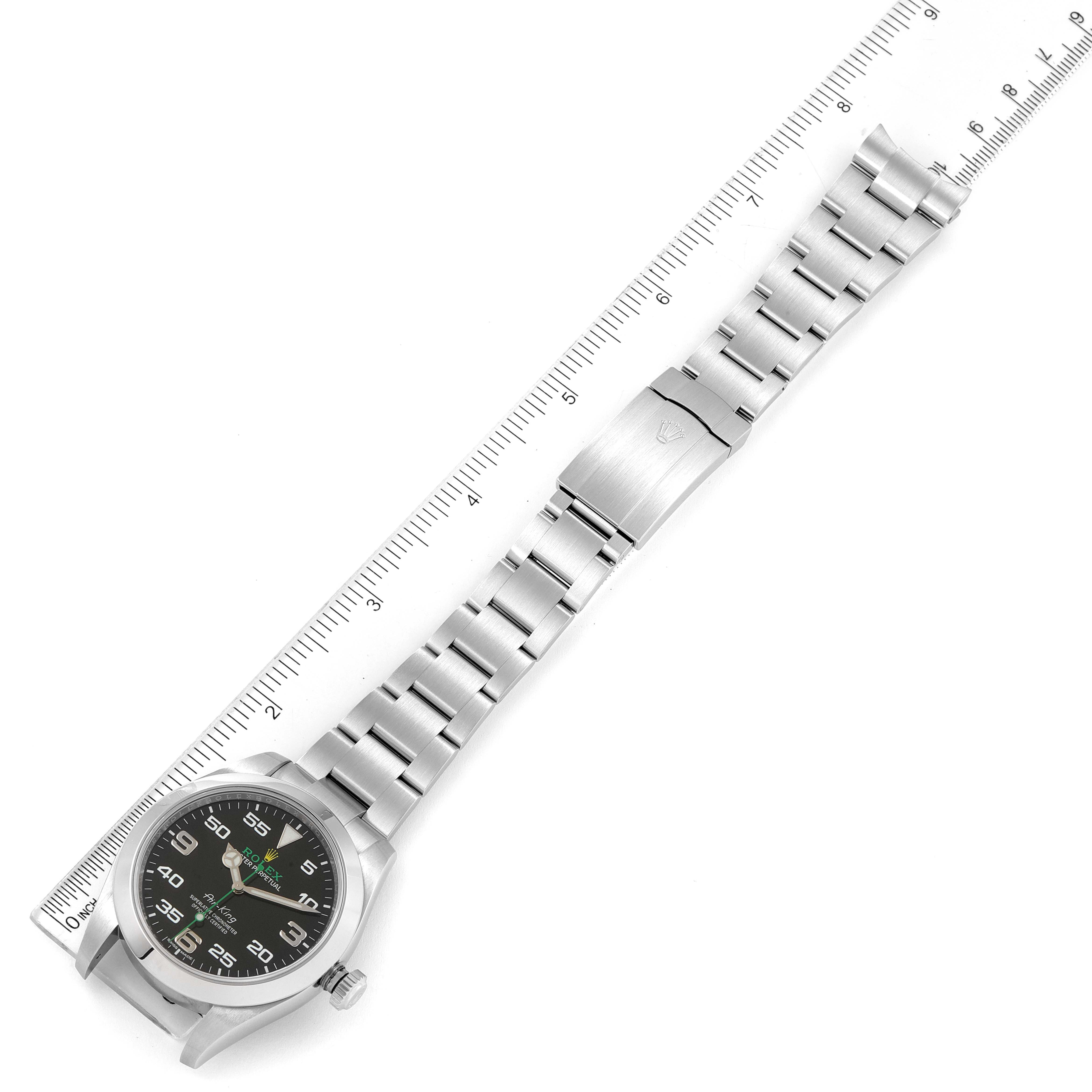 The image shows a top-down view of a Rolex Air-King 116900 Men's Stainless Steel Black Dial 116900 Men's Stainless Steel Black Dial watch, including its face, bracelet, and clasp.