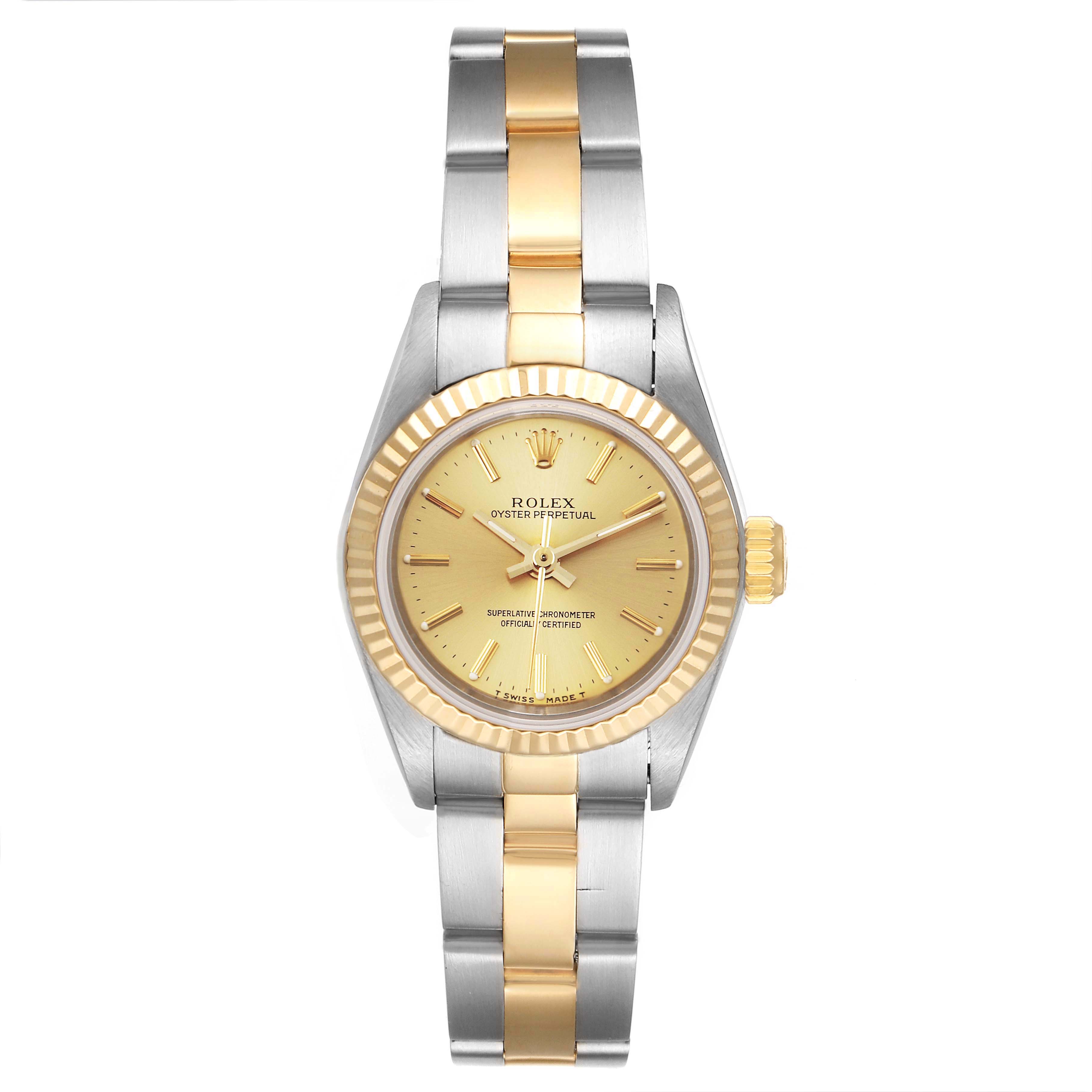 The image shows a front view of a Rolex Oyster Perpetual 67193 Women's Steel and Gold (two tone) Champagne Dial 67193 Women's Steel and Gold (two tone) Champagne Dial watch, displaying its gold and silver bracelet, gold dial, and fluted bezel.