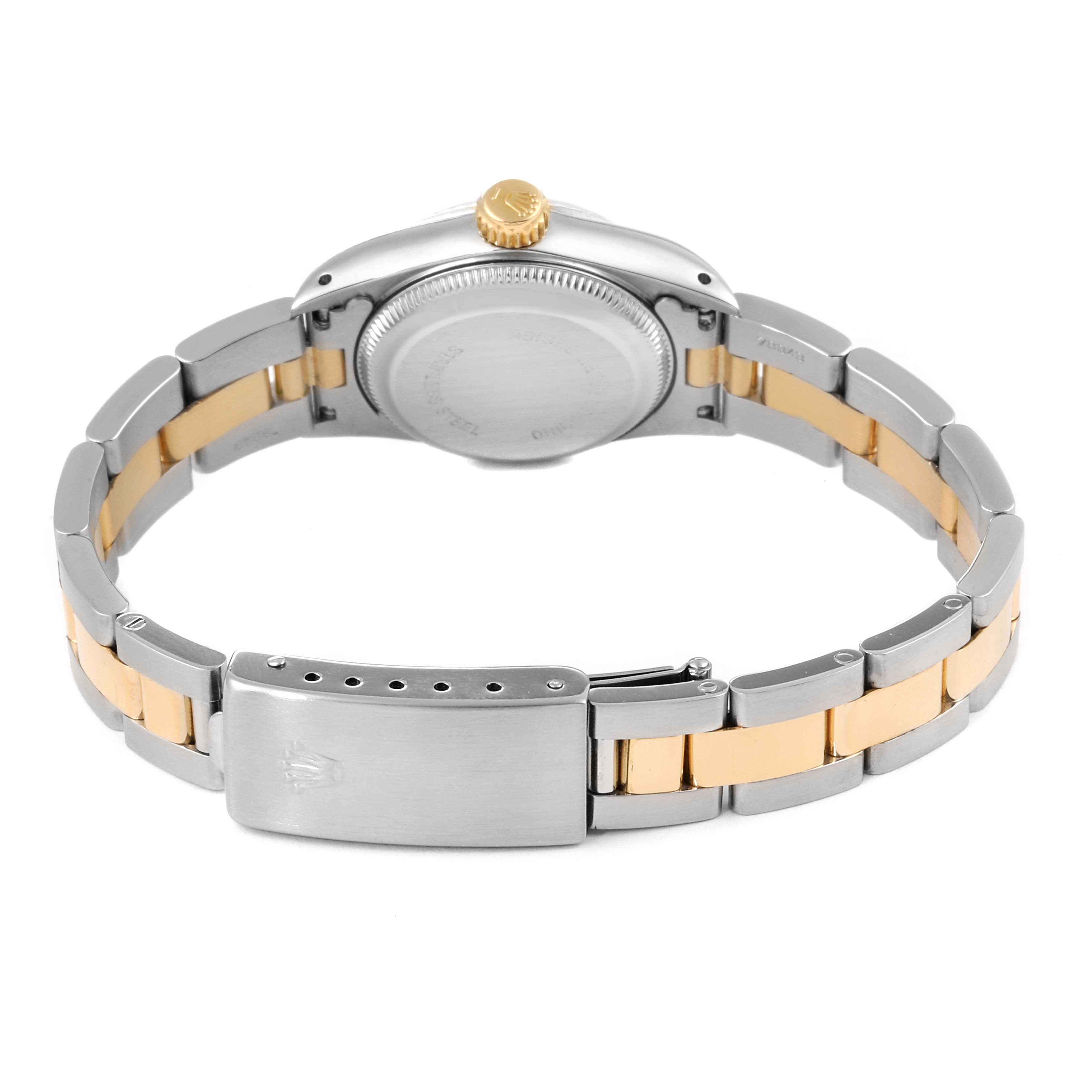 The image shows the backside of a Rolex Oyster Perpetual 67193 Women's Steel and Gold (two tone) Champagne Dial 67193 Women's Steel and Gold (two tone) Champagne Dial watch, focusing on the clasp and band.