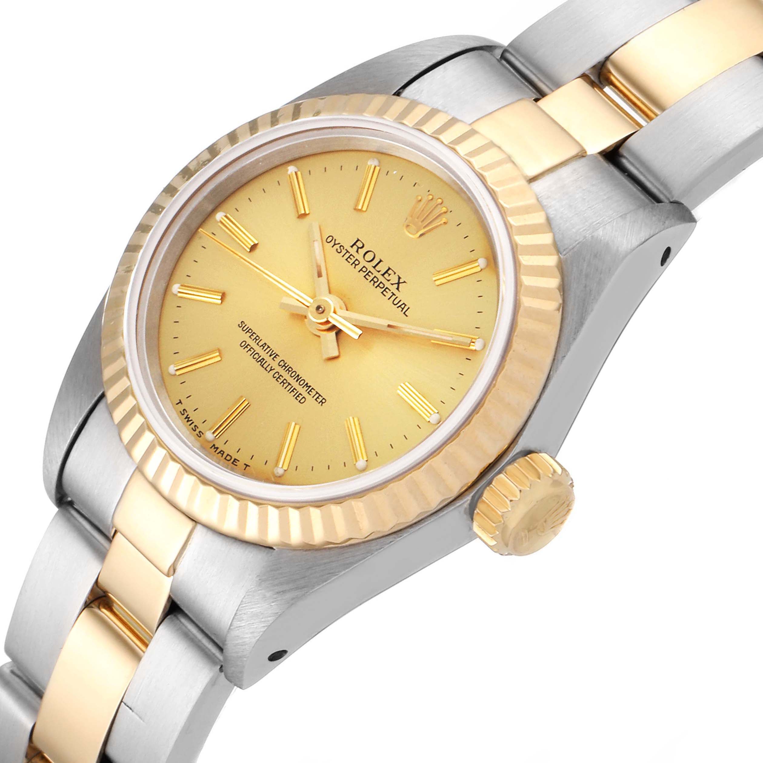 The image shows a top and slightly angled view of a Rolex Oyster Perpetual 67193 Women's Steel and Gold (two tone) Champagne Dial 67193 Women's Steel and Gold (two tone) Champagne Dial watch, highlighting its dial, bezel, crown, and part of the bracelet.