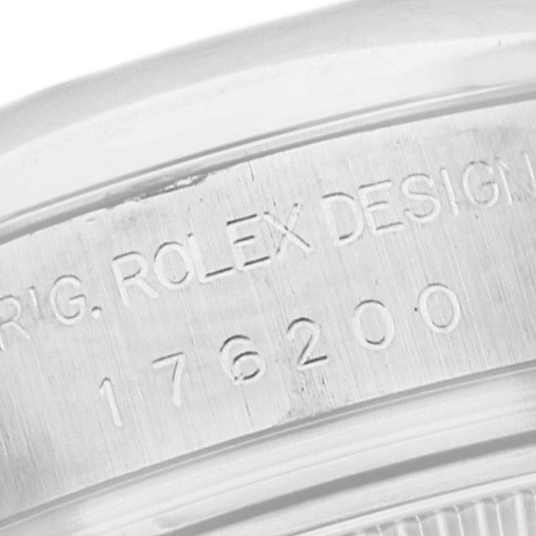 The image shows a close-up of the engraved model number on the side of the Rolex Oyster Perpetual 176200 Women's Stainless Steel Black Dial 176200 Women's Stainless Steel Black Dial watch case.