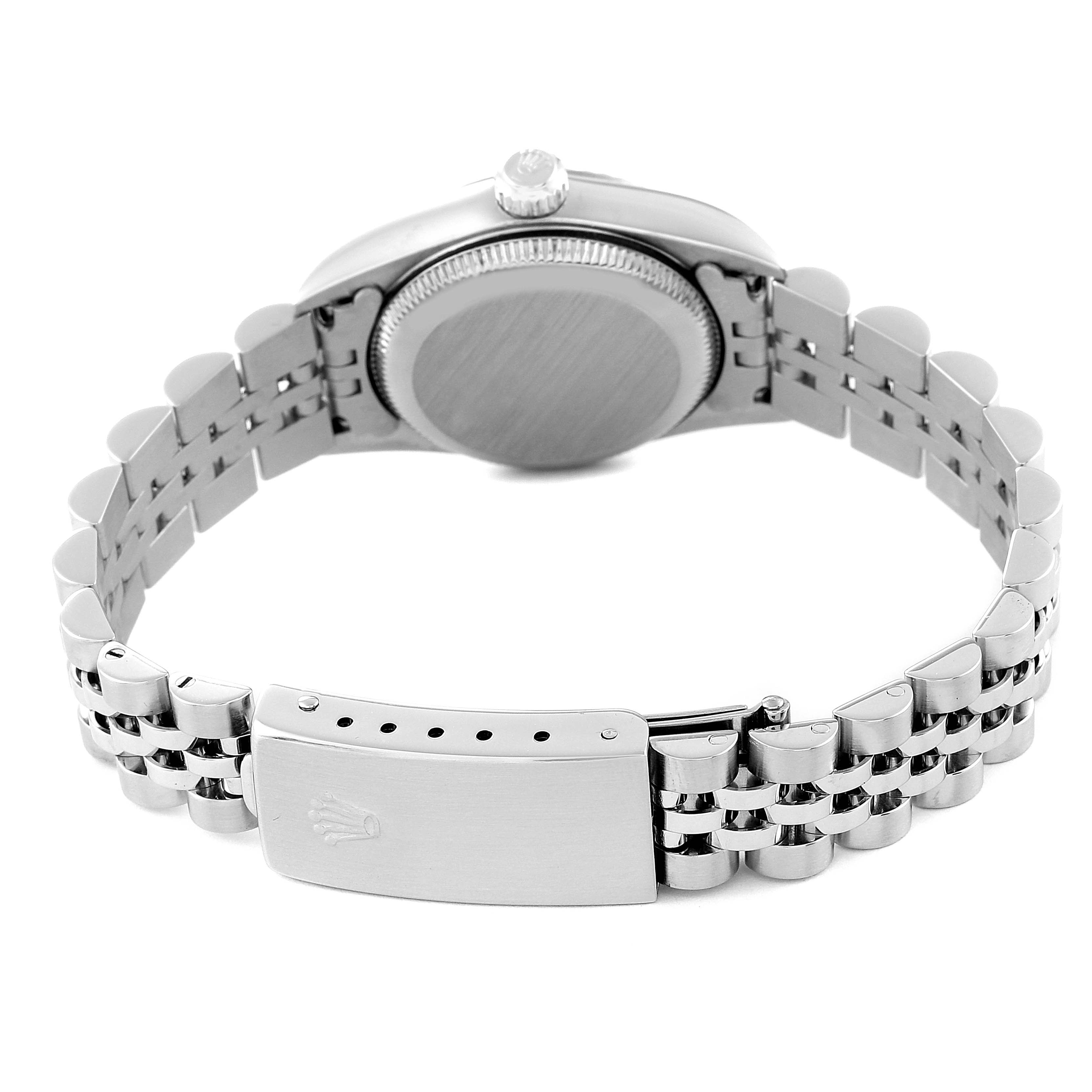 The image shows the back view of a Rolex Oyster Perpetual 76094 Women's Stainless Steel Black Dial 76094 Women's Stainless Steel Black Dial watch, highlighting its case back, bracelet, and clasp.