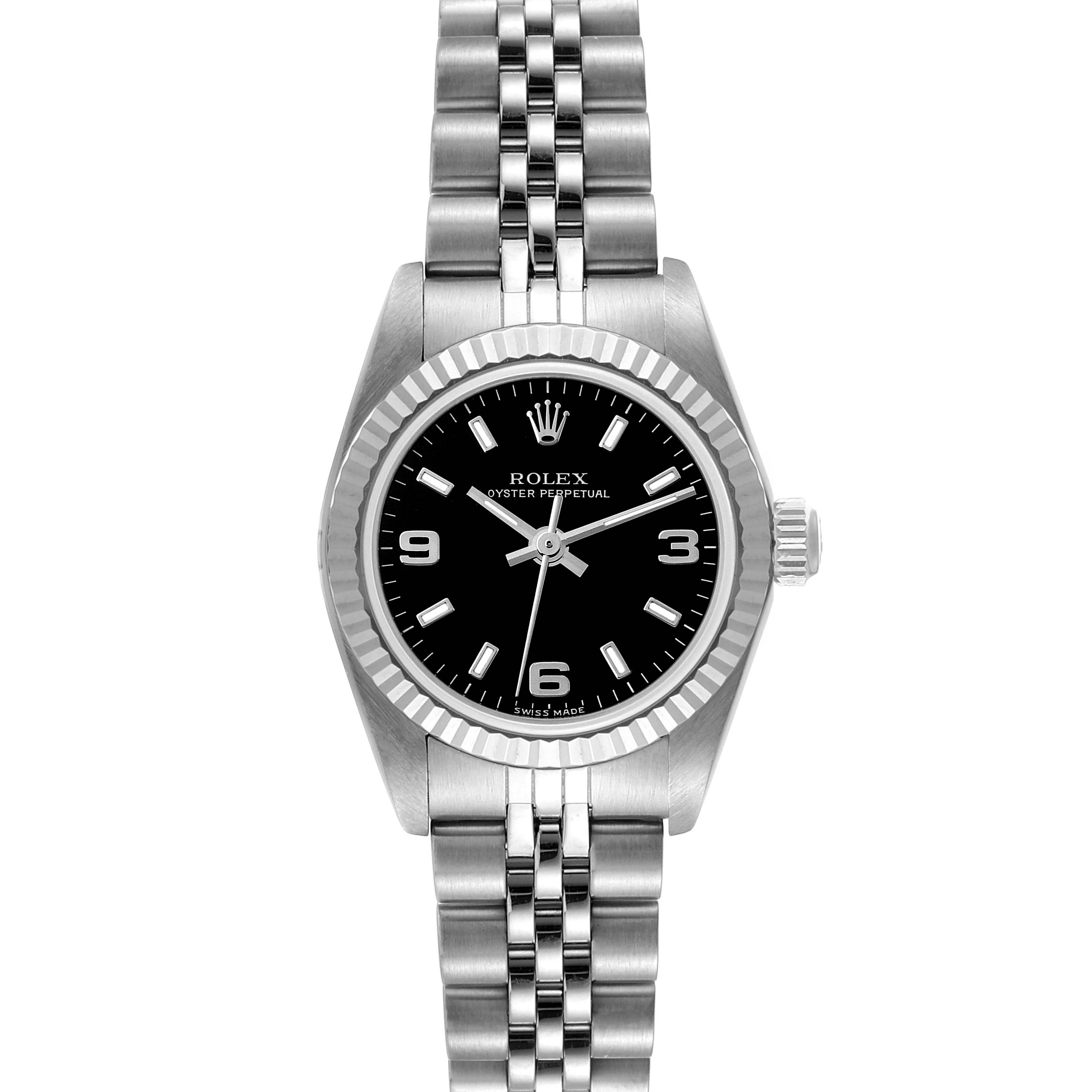 This image shows a frontal view of a Rolex Oyster Perpetual 76094 Women's Stainless Steel Black Dial 76094 Women's Stainless Steel Black Dial watch, displaying the face, bezel, crown, and part of the bracelet.