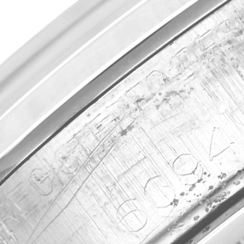 This close-up image shows the inner caseback engraving of a Vintage Collection Rolex watch.