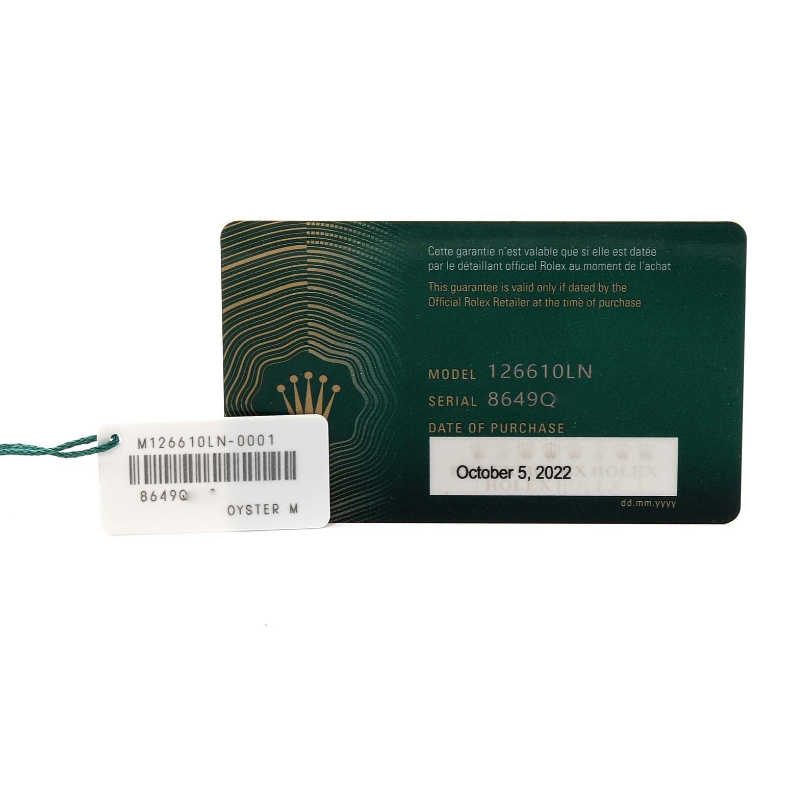 The image shows the warranty card and tag for the Rolex Submariner 126610LN Men
s Stainless Steel Black Dial 126610LN Men
s Stainless Steel Black Dial model 126610LN.