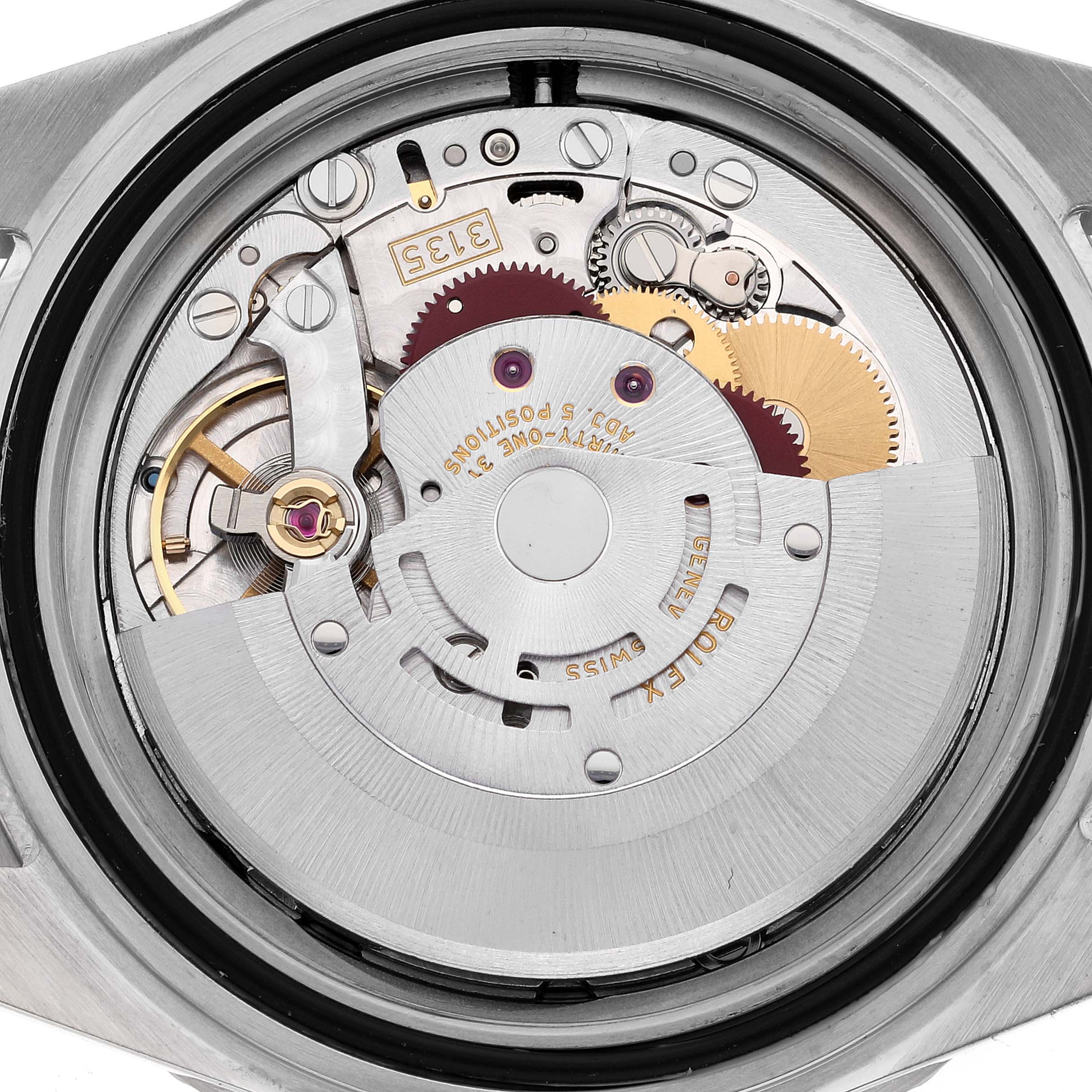 The image shows the internal mechanical movement of a Rolex Submariner 16610 Men
s Stainless Steel Black Dial 16610 Men
s Stainless Steel Black Dial watch viewed from the back case.