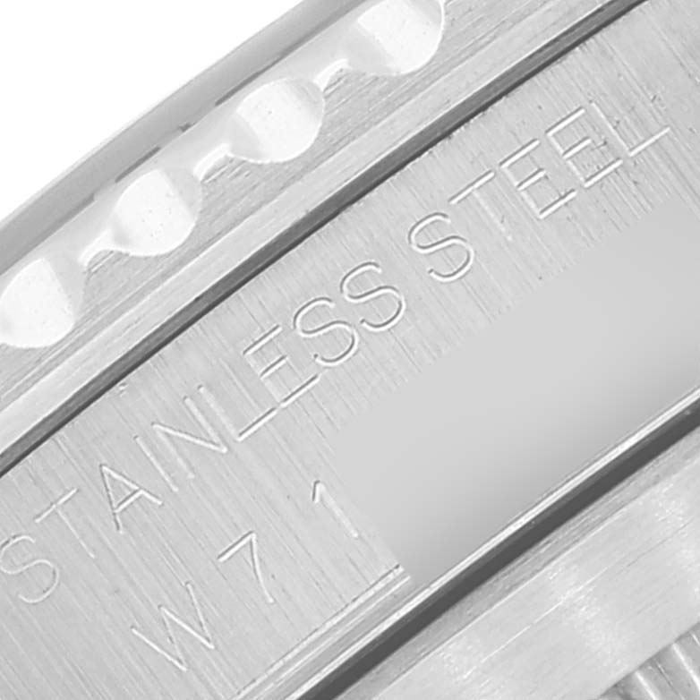 This image shows a close-up of the Rolex Submariner 14060 Men's Stainless Steel Black Dial 14060 Men's Stainless Steel Black Dial's stainless steel case with visible detailing.