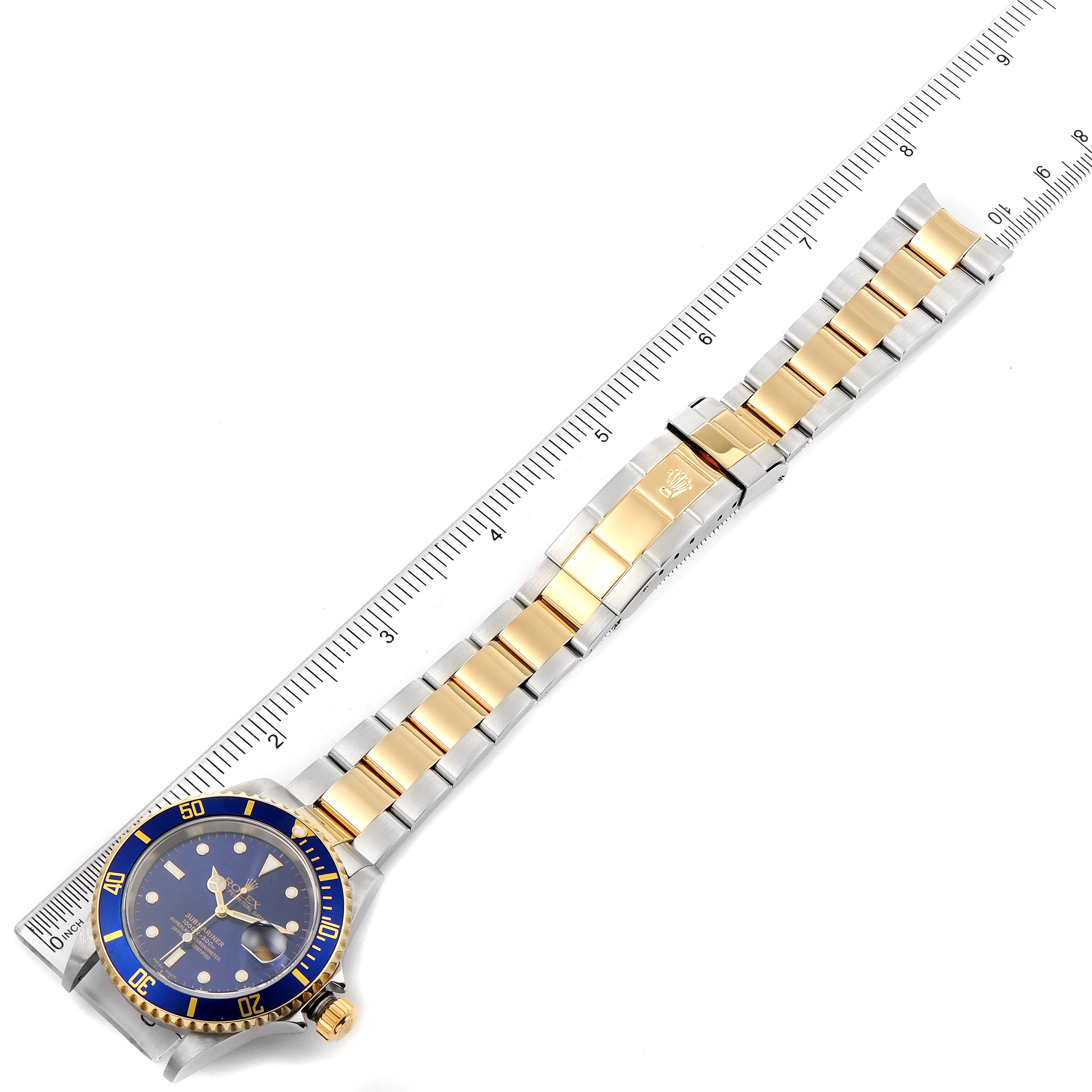This image shows a top view of a Rolex Submariner 16613 Men
s Steel and Gold (two tone) Blue Dial 16613 Men
s Steel and Gold (two tone) Blue Dial watch, highlighting its two-tone bracelet and the blue dial and bezel.