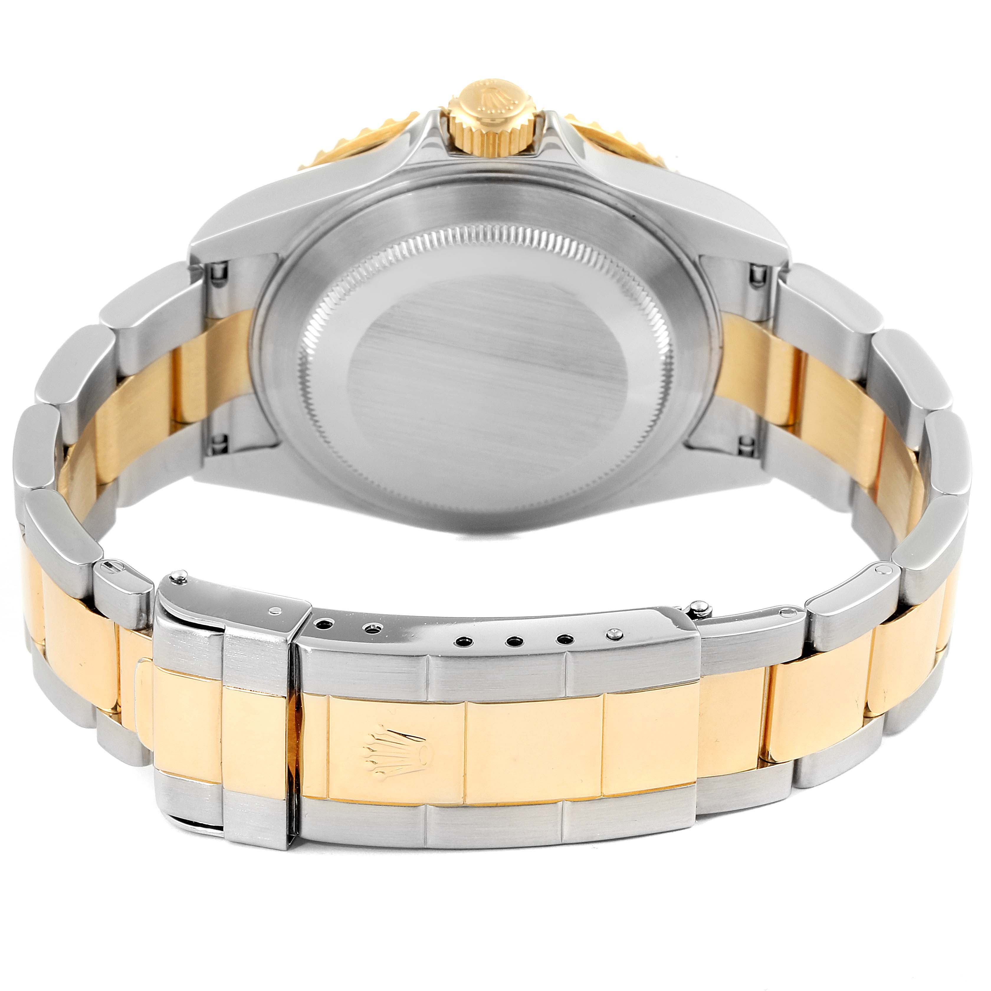 This image shows the back view of a Rolex Submariner 16613 Men
s Steel and Gold (two tone) Blue Dial 16613 Men
s Steel and Gold (two tone) Blue Dial, highlighting its two-tone metal bracelet and case back.