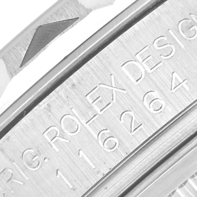The image shows a close-up of the engraved serial number and design details on the side of a Rolex Turn-o-Graph 116264 Men's Stainless Steel White Dial 116264 Men's Stainless Steel White Dial watch.