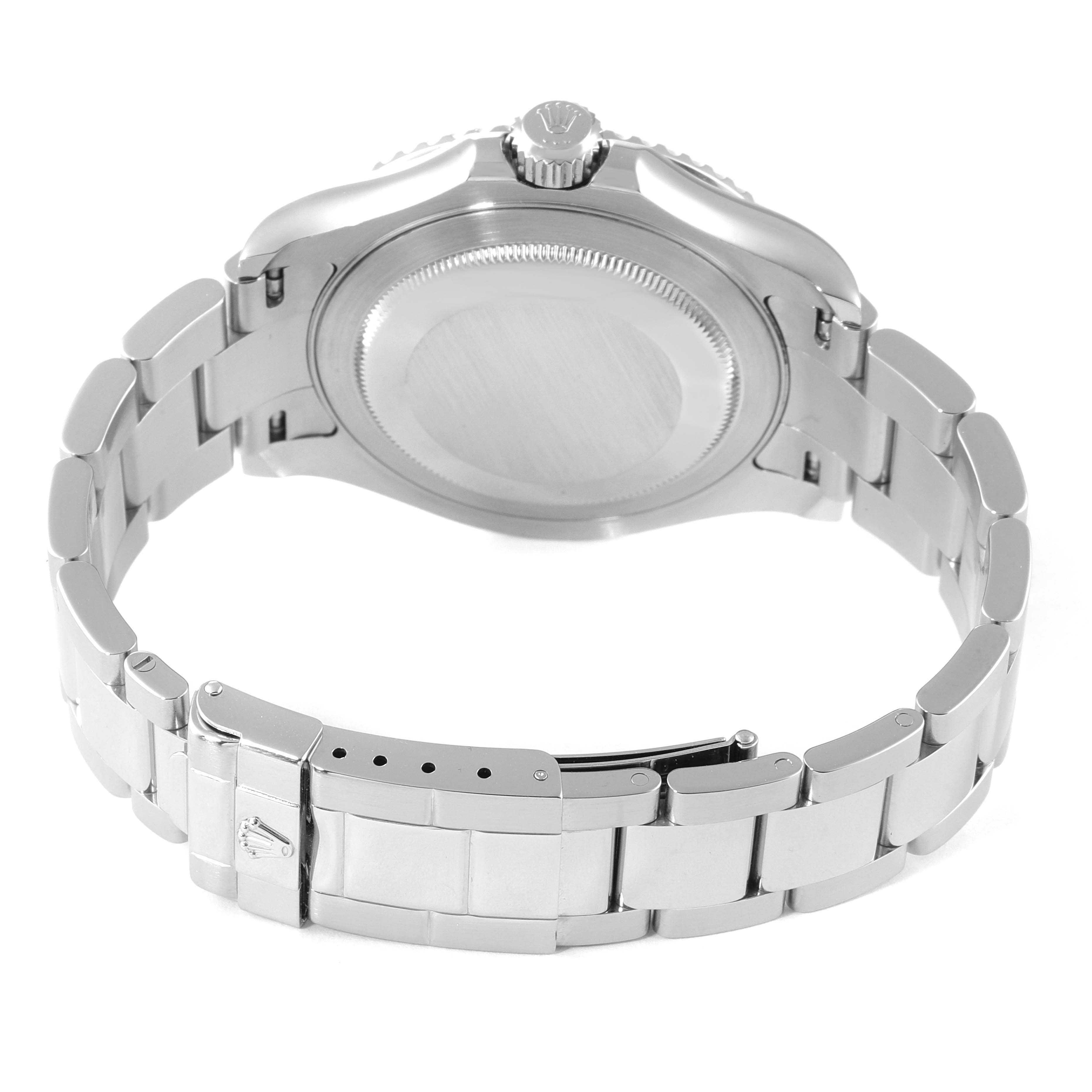 This is a rear view of the Rolex Yacht-Master 16622 Men's Stainless Steel Silver Dial 16622 Men's Stainless Steel Silver Dial showing the case back, crown, and metal bracelet with a clasp.