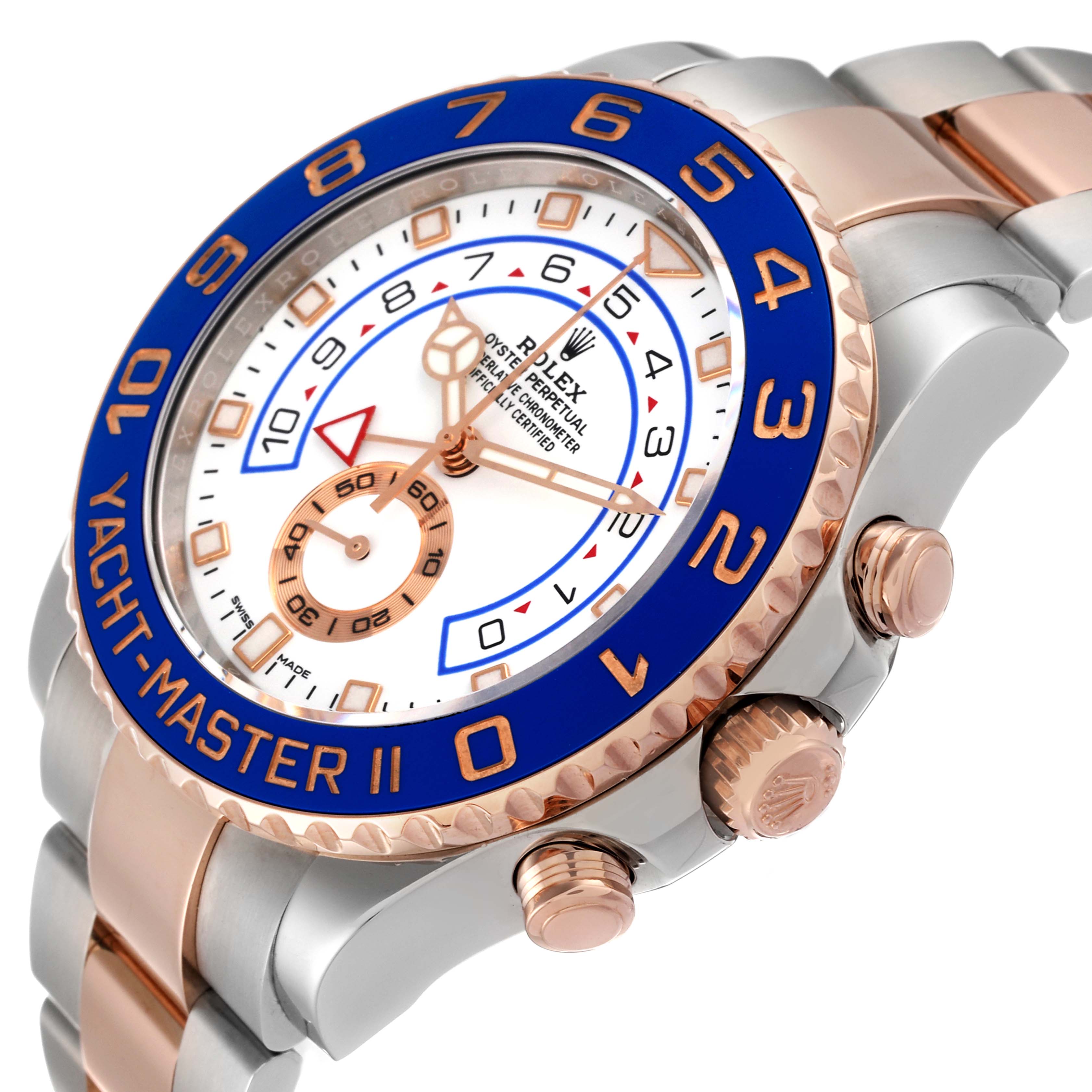 The image shows a side angle of a Rolex Yacht-Master 116681 Men's Steel and Gold (two tone) White Dial 116681 Men's Steel and Gold (two tone) White Dial II watch, highlighting the dial, bezel, and crown.