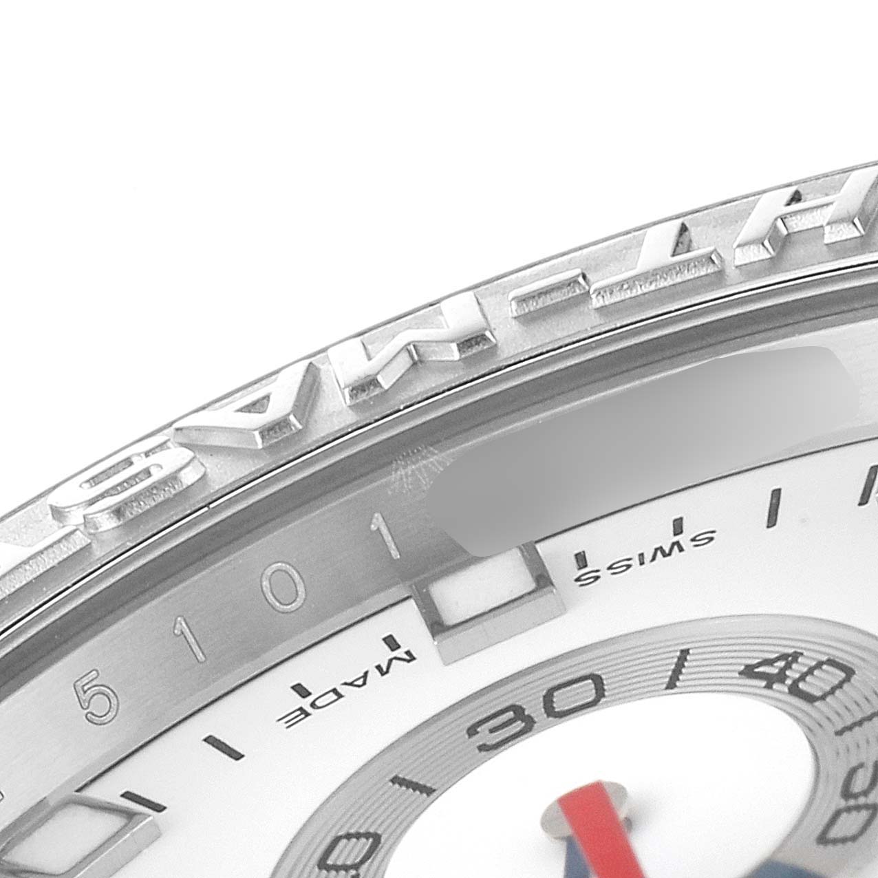 The image shows a close-up angled view of the bezel and part of the dial of a Rolex Yacht-Master 116689 Men's White Gold White Dial 116689 Men's White Gold White Dial watch.