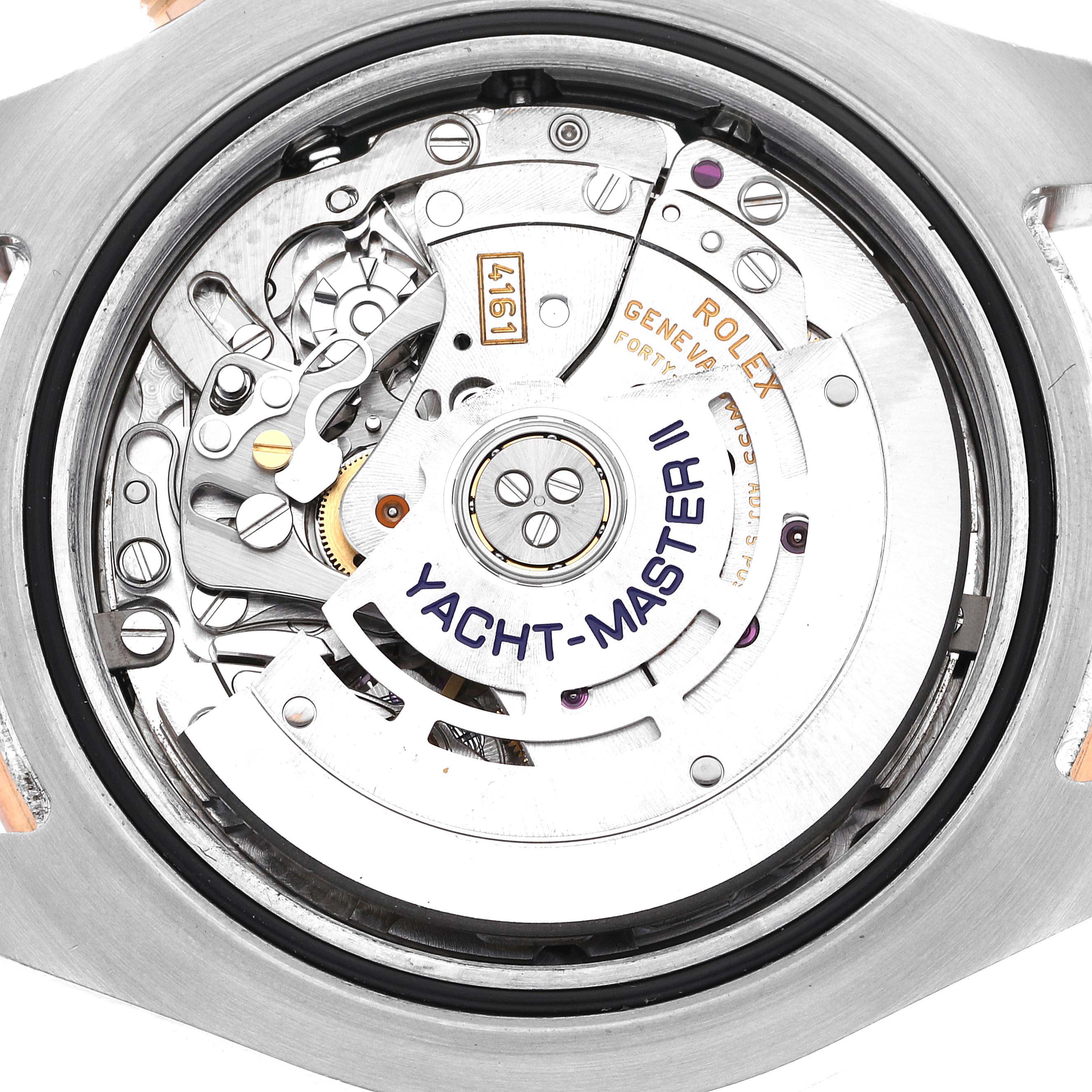 The image shows the internal movement mechanism of a Rolex Yacht-Master 116681 Men's Steel and Gold (two tone) White Dial 116681 Men's Steel and Gold (two tone) White Dial II watch from a rear angle.