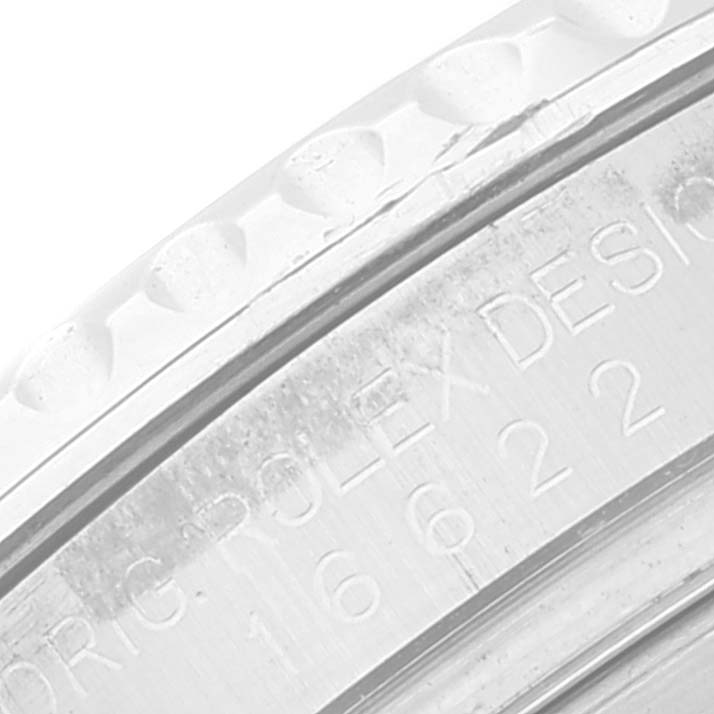 The close-up image shows the edge of the bezel and engraved text on the case of a Rolex Yacht-Master 16622 Men's Stainless Steel Silver Dial 16622 Men's Stainless Steel Silver Dial watch.