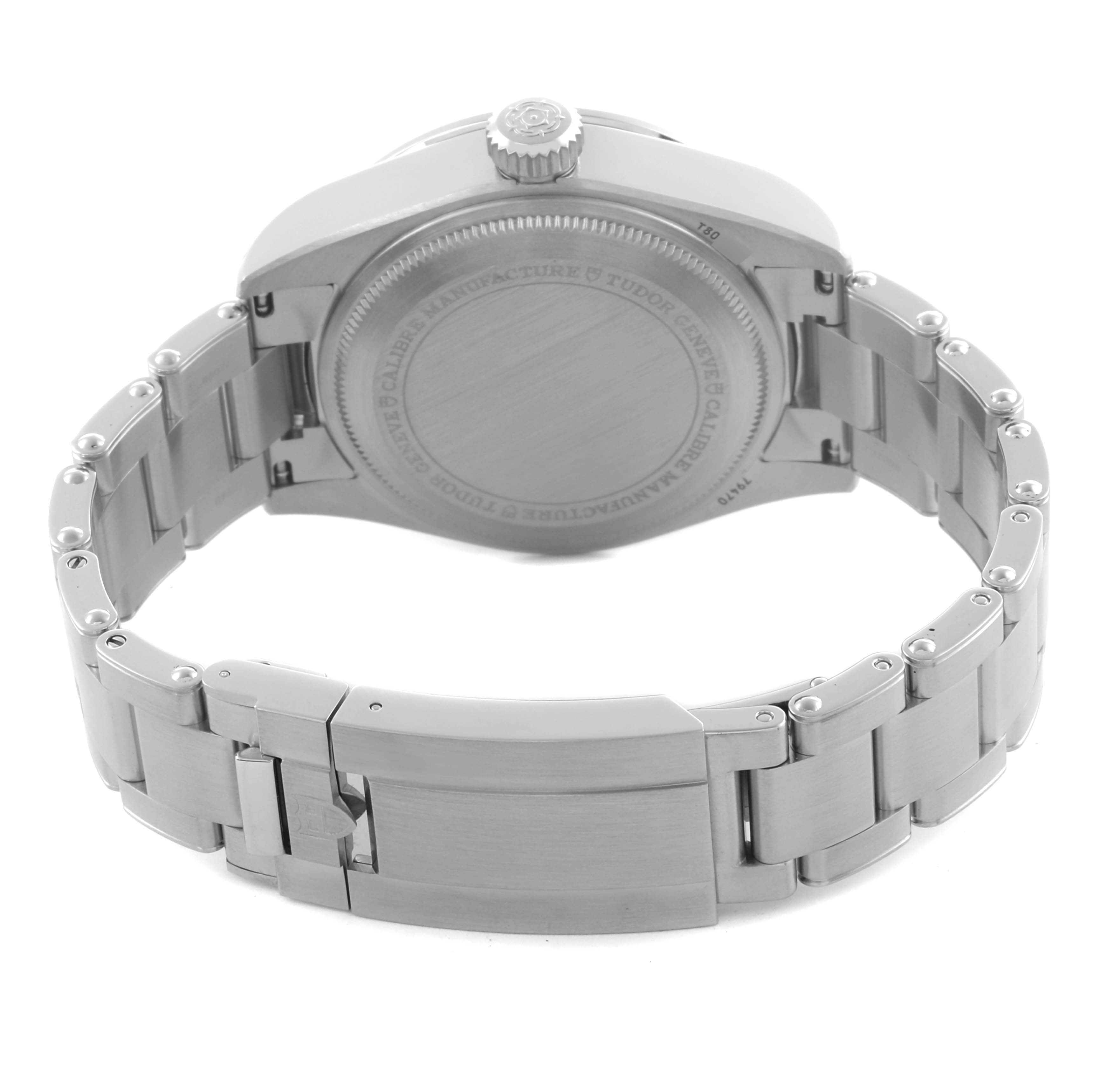 The image shows the Tudor Heritage Black Bay 79470 Men's Stainless Steel Black Dial 79470 Men's Stainless Steel Black Dial watch from the back, highlighting the case back, bracelet, and clasp.